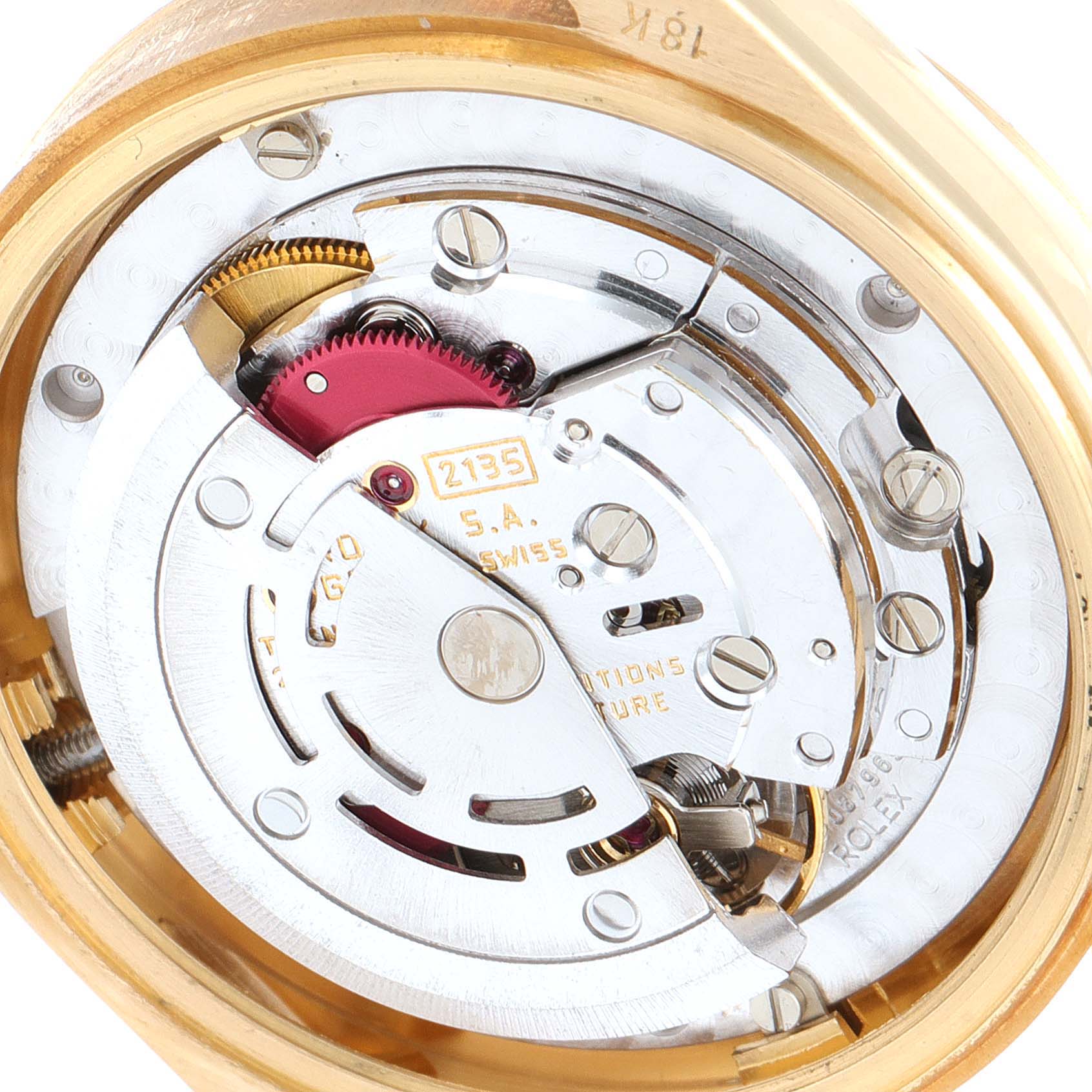 This image shows the internal movement mechanism of a Rolex President 38706 Women
s Yellow Gold Champagne Dial 38706 Women
s Yellow Gold Champagne Dial model watch in close-up detail.