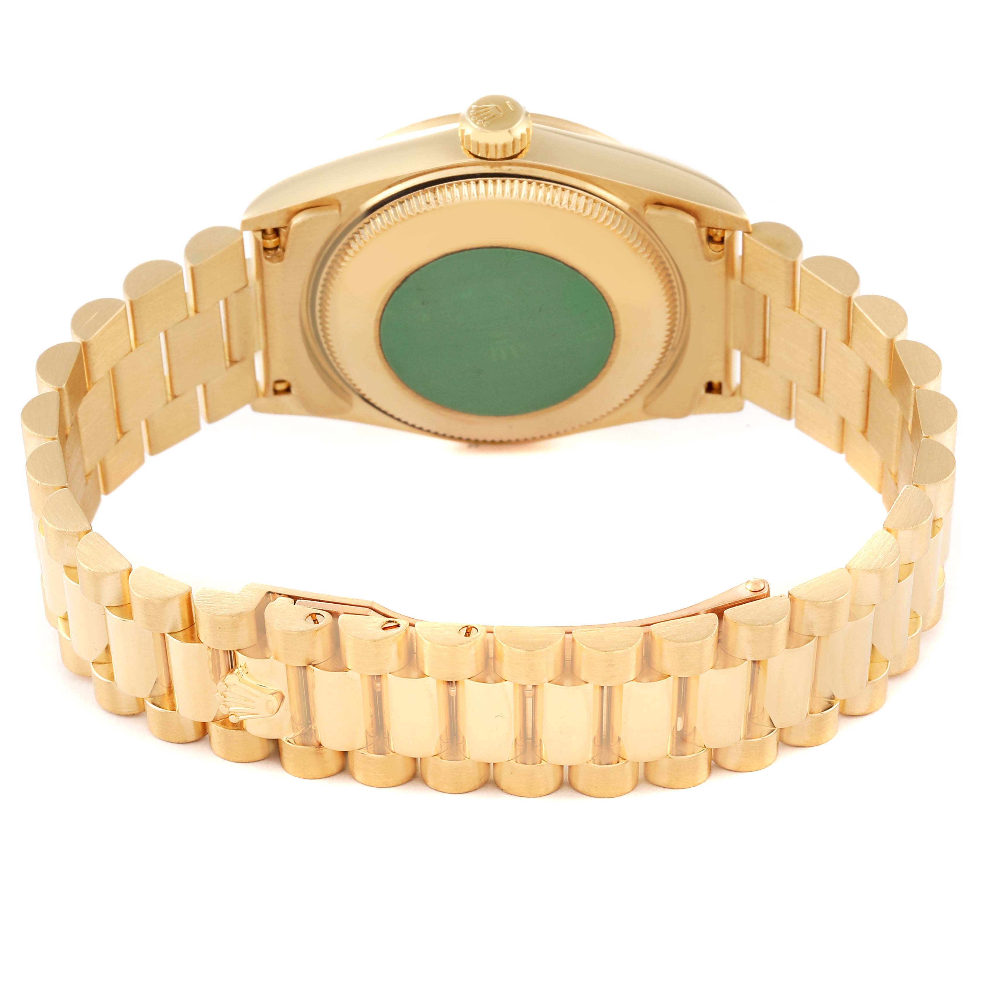 This image shows the back case and bracelet of a Rolex President 68278 Women
s Yellow Gold Champagne Dial 68278 Women
s Yellow Gold Champagne Dial model at an oblique angle.