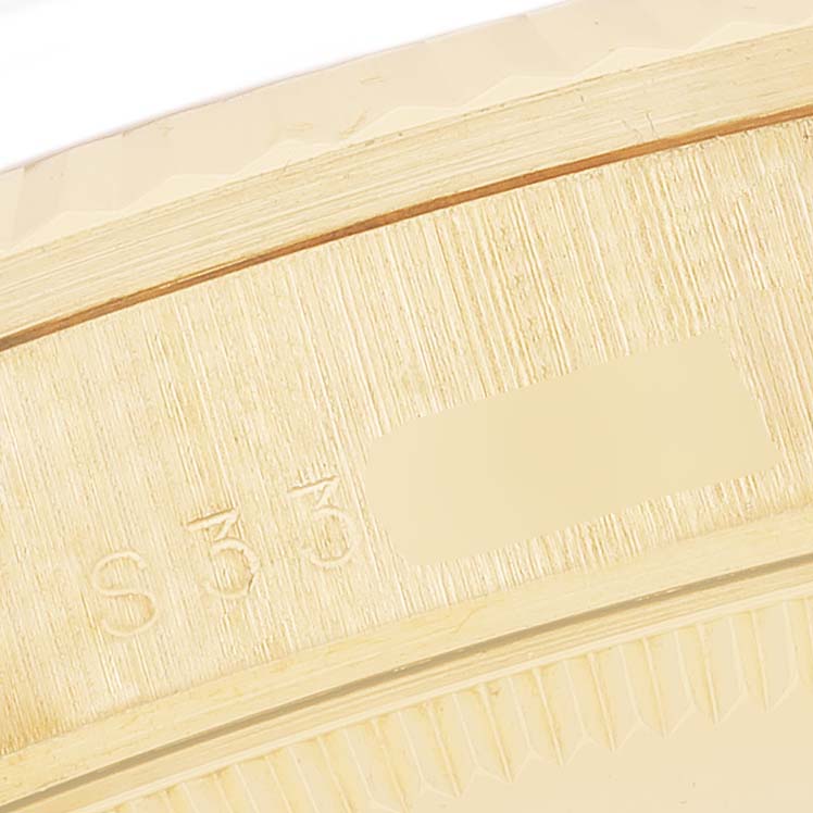 This image shows a close-up of the case side and serial number of the Rolex President 68278 Women
s Yellow Gold Champagne Dial 68278 Women
s Yellow Gold Champagne Dial model watch.