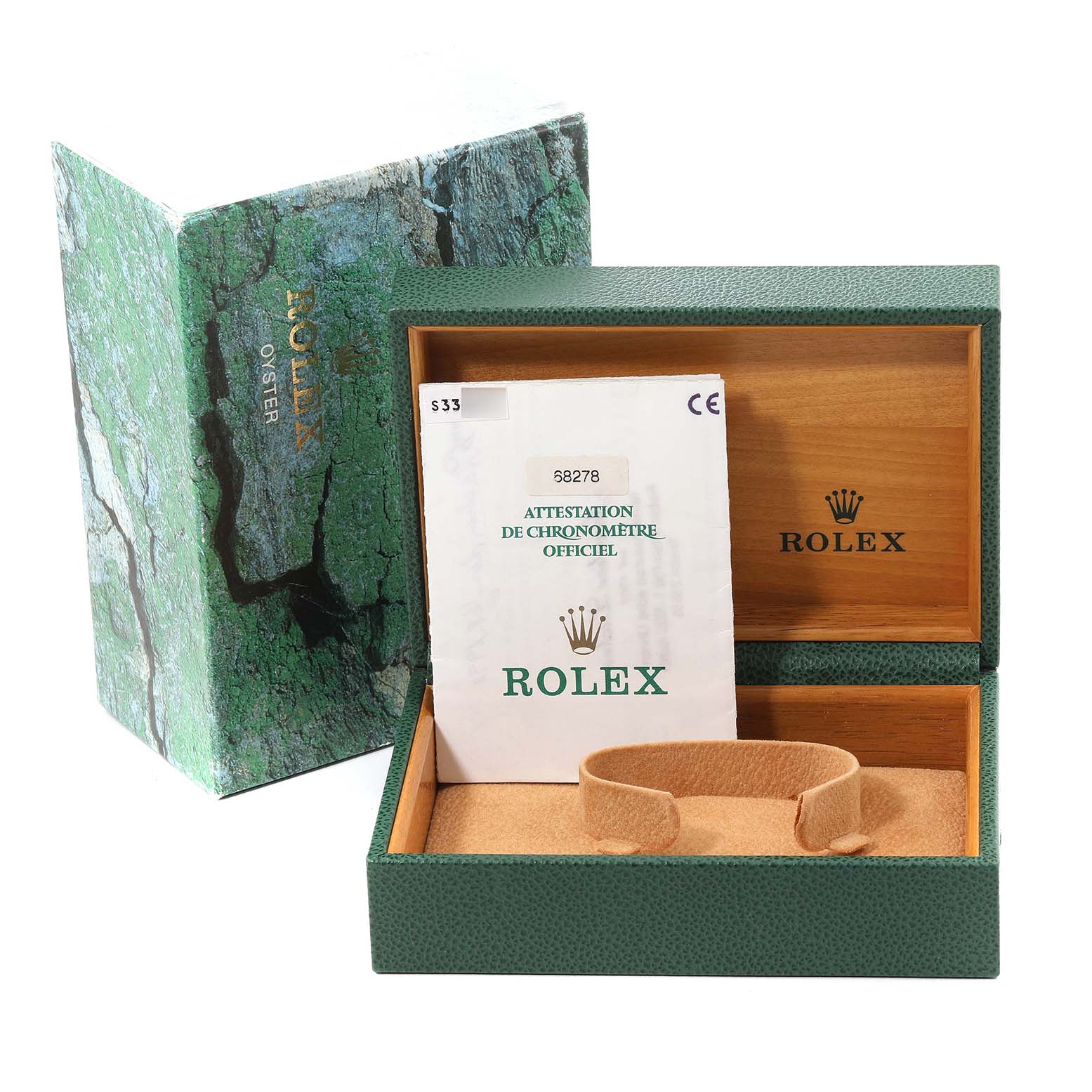 The image shows a Rolex President 68278 Women
s Yellow Gold Champagne Dial 68278 Women
s Yellow Gold Champagne Dial model watch box, open with a green exterior, displaying official documents inside.