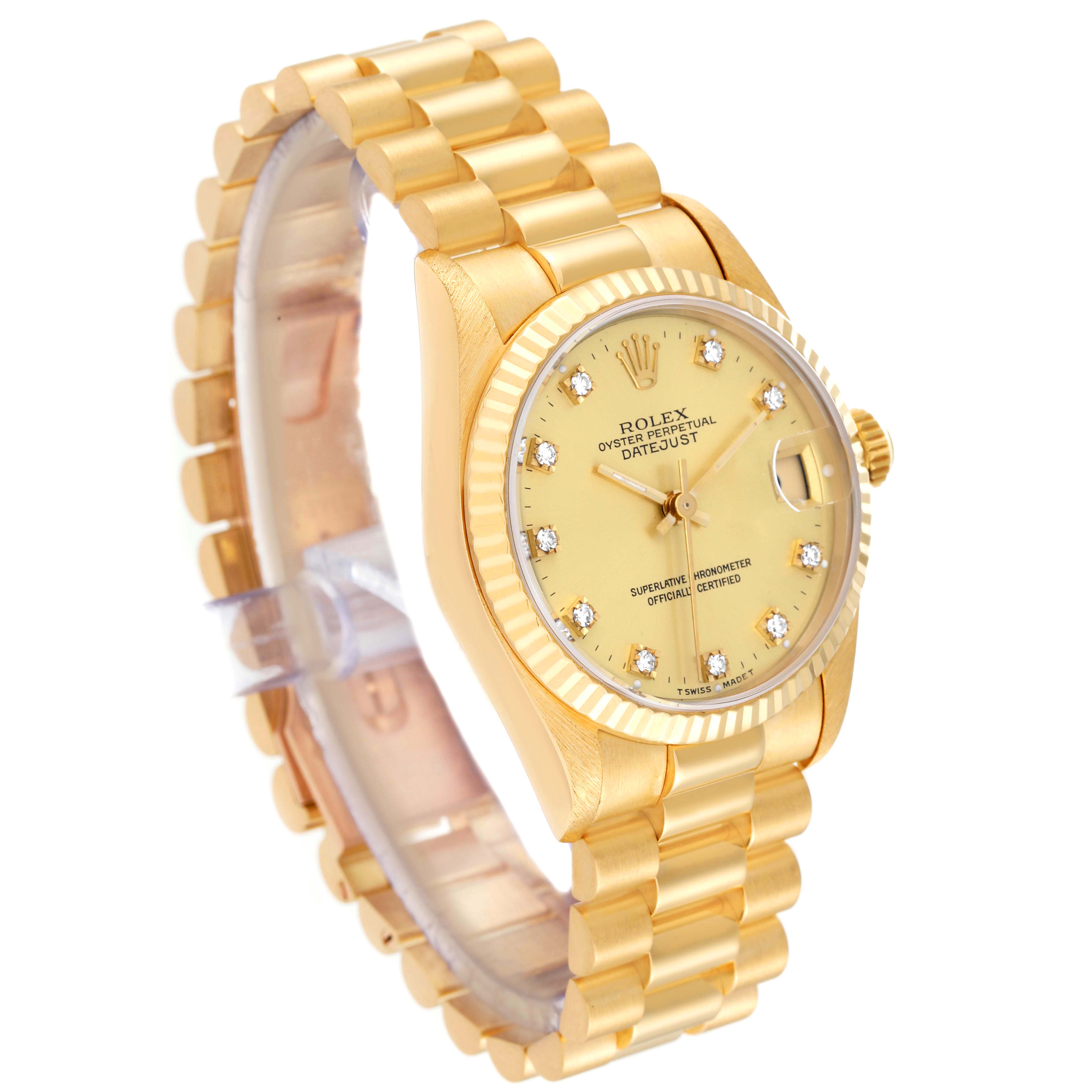 This image shows a side-angle view of a Rolex President 68278 Women's Yellow Gold Black Dial 68278 Women's Yellow Gold Black Dial model watch, displaying its gold band, dial, and fluted bezel.