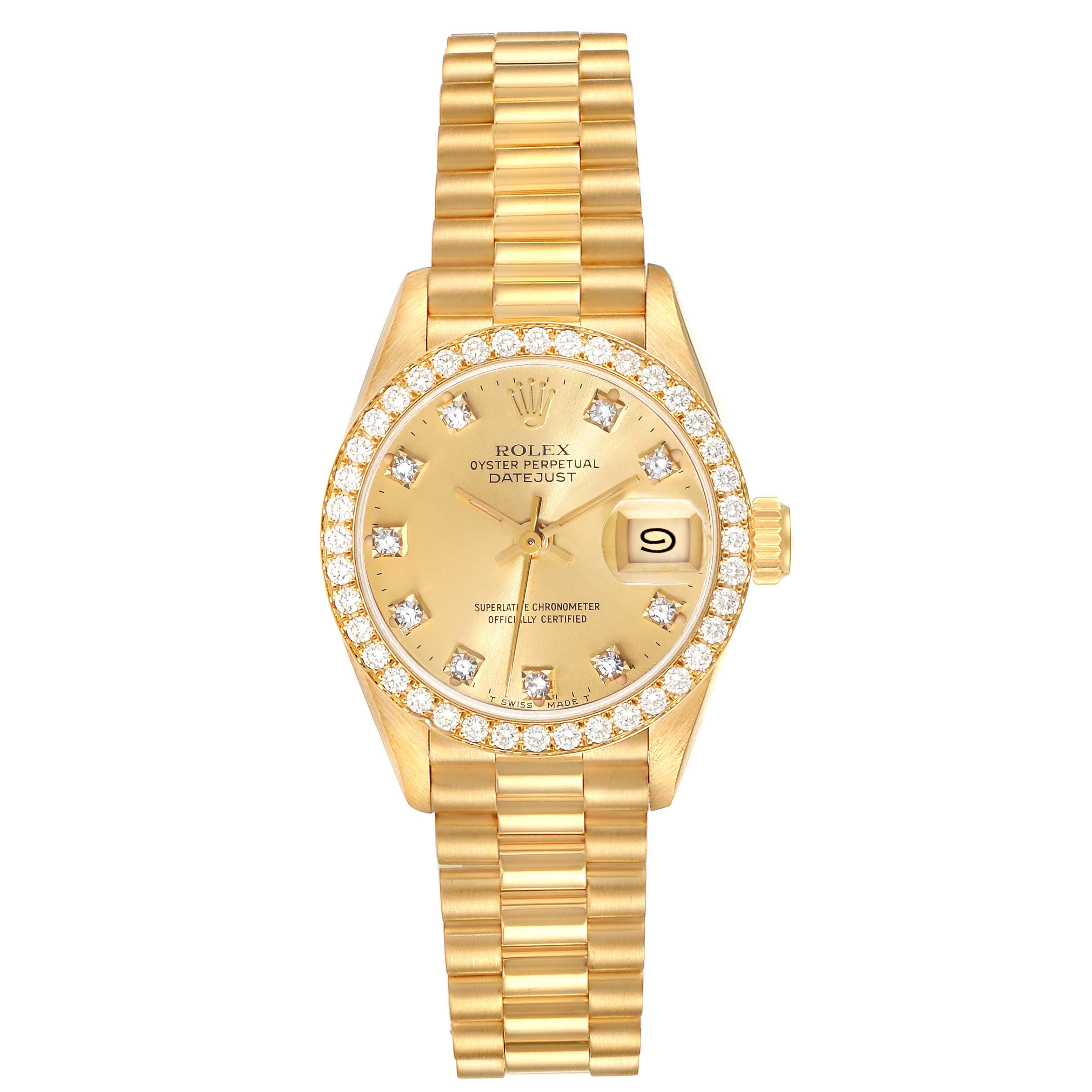 The image shows a front view of a Rolex President 69138G Women
s Yellow Gold Champagne Dial 69138G Women
s Yellow Gold Champagne Dial Datejust watch, featuring a gold strap and diamond-encrusted bezel.