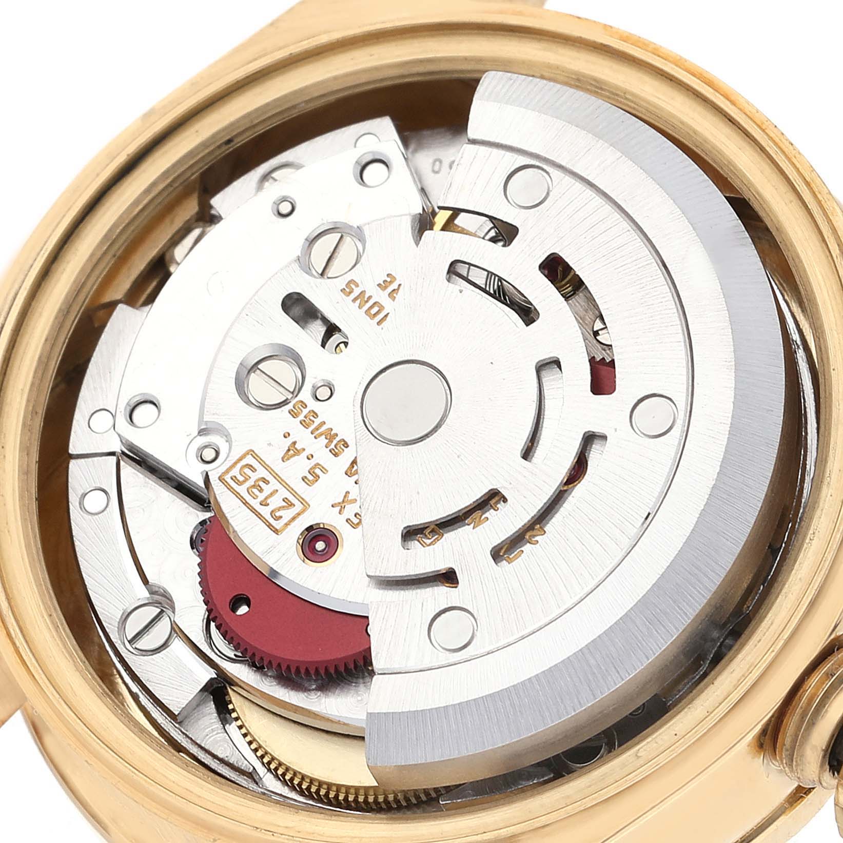 This image shows the internal movement mechanism of a Rolex President 69138G Women
s Yellow Gold Champagne Dial 69138G Women
s Yellow Gold Champagne Dial model watch from a top-down angle.