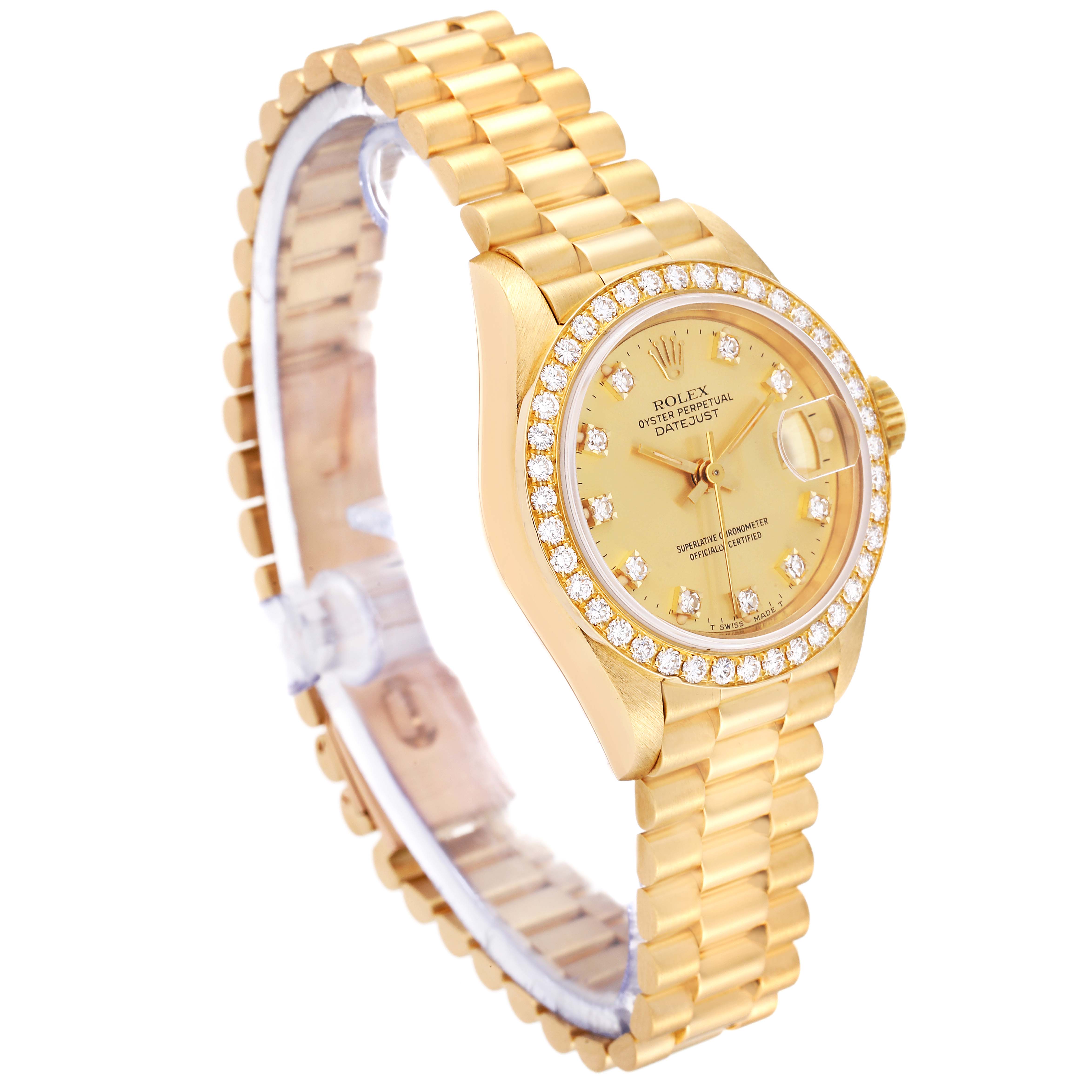 The Rolex President 69138G Women
s Yellow Gold Champagne Dial 69138G Women
s Yellow Gold Champagne Dial watch is shown at a slight angle, highlighting its gold bracelet, diamond-encrusted bezel, and dial.