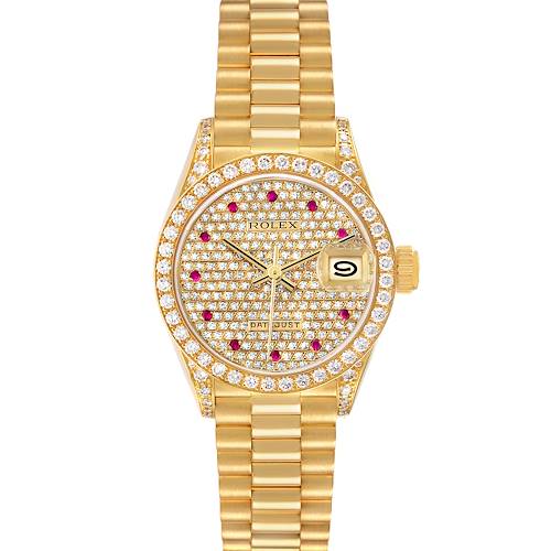 The Rolex President 69158 Women's Yellow Gold Champagne Dial watch is shown from the front, displaying the dial, bezel, and bracelet with diamond and ruby embellishments.
