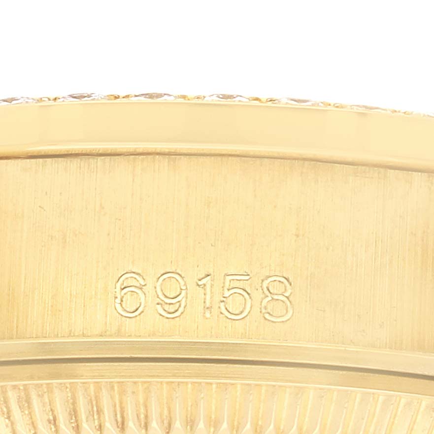 The image shows a close-up of the side of a Rolex President 69158 Women's Yellow Gold Champagne Dial watch, focusing on the model number 69158.
