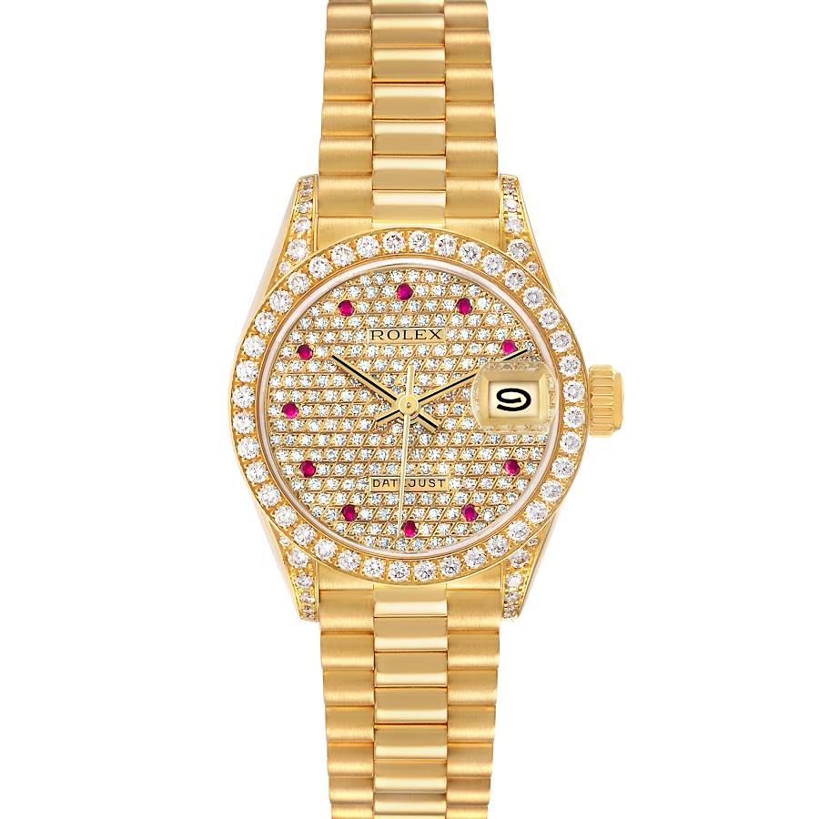 The Rolex President 69158 Women's Yellow Gold Champagne Dial model watch is shown from a top view, displaying its diamond-encrusted dial, bezel, and gold bracelet.