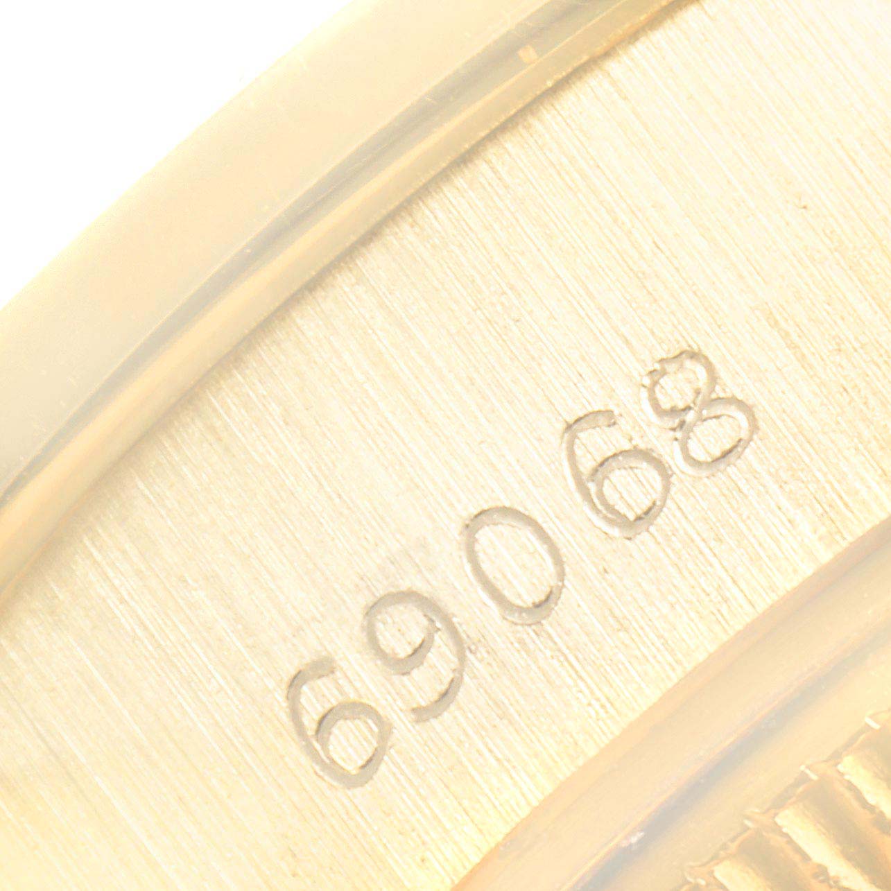 This is a close-up of the inner case showing the model number "69068" of a Rolex President 69068 Women
s Yellow Gold Champagne Dial 69068 Women
s Yellow Gold Champagne Dial watch.