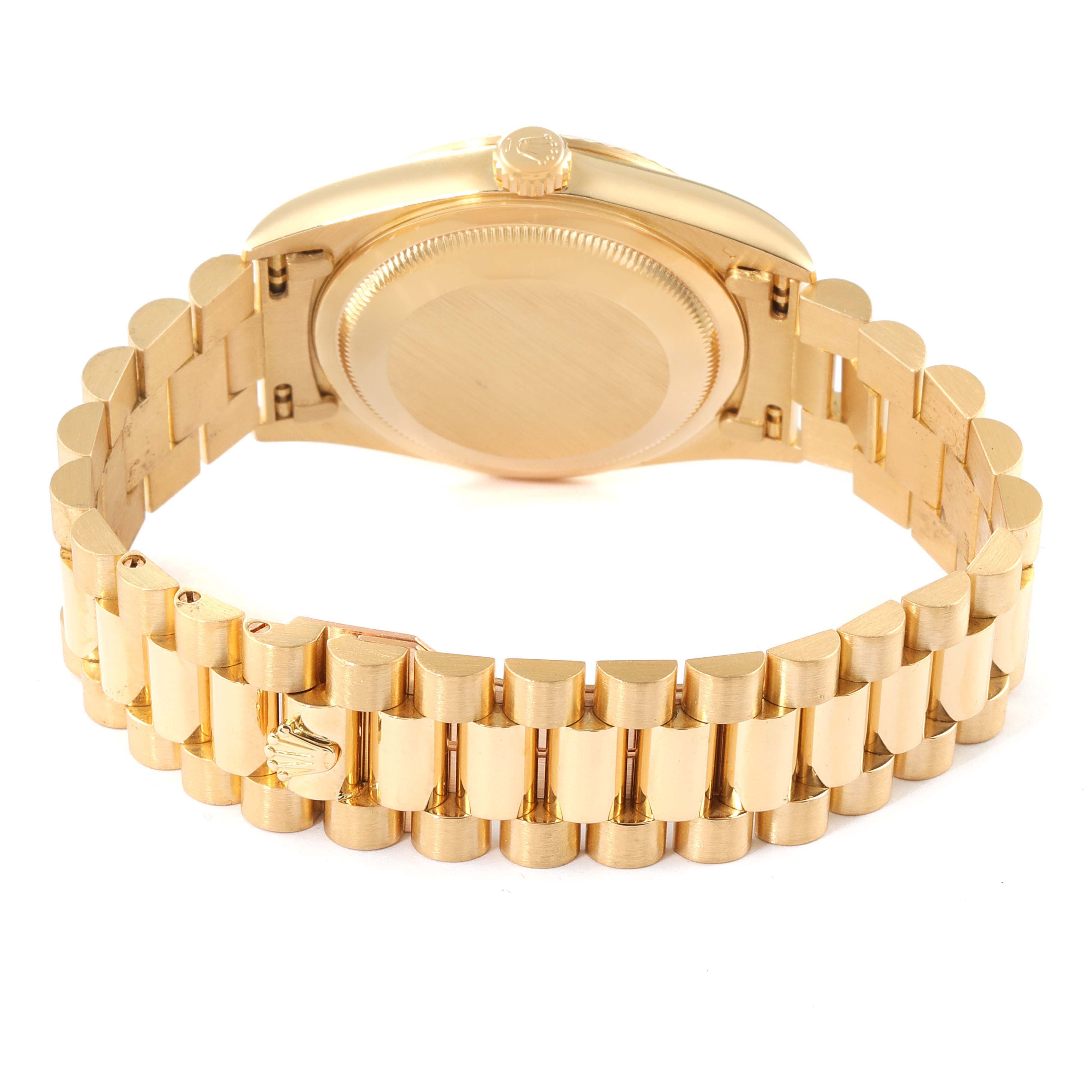 This image shows the back case and bracelet of a Rolex President 18238 Men's Yellow Gold Champagne Dial 18238 Men's Yellow Gold Champagne Dial model watch from an angled rear view.