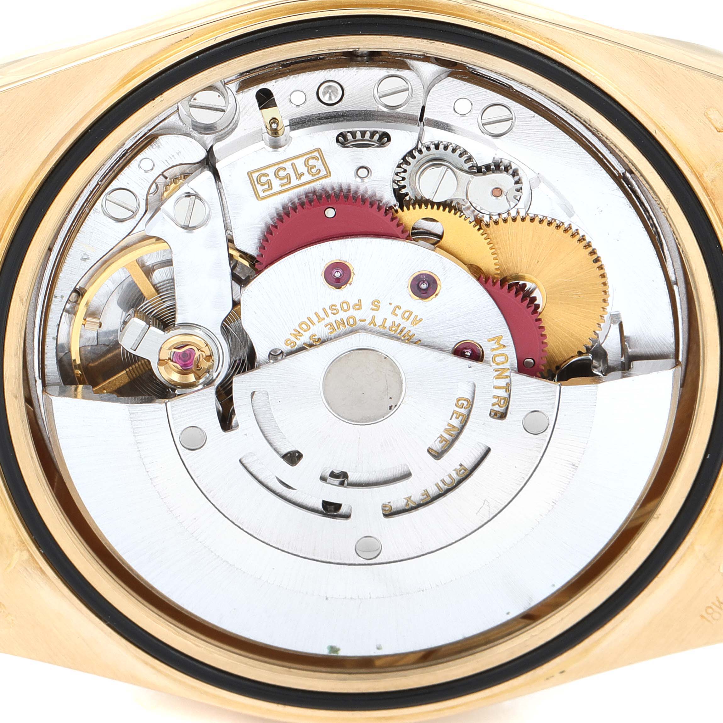 This image shows the inner mechanical movement parts of a Rolex President 18238 Men's Yellow Gold Champagne Dial 18238 Men's Yellow Gold Champagne Dial model watch from a rear-opened view angle.