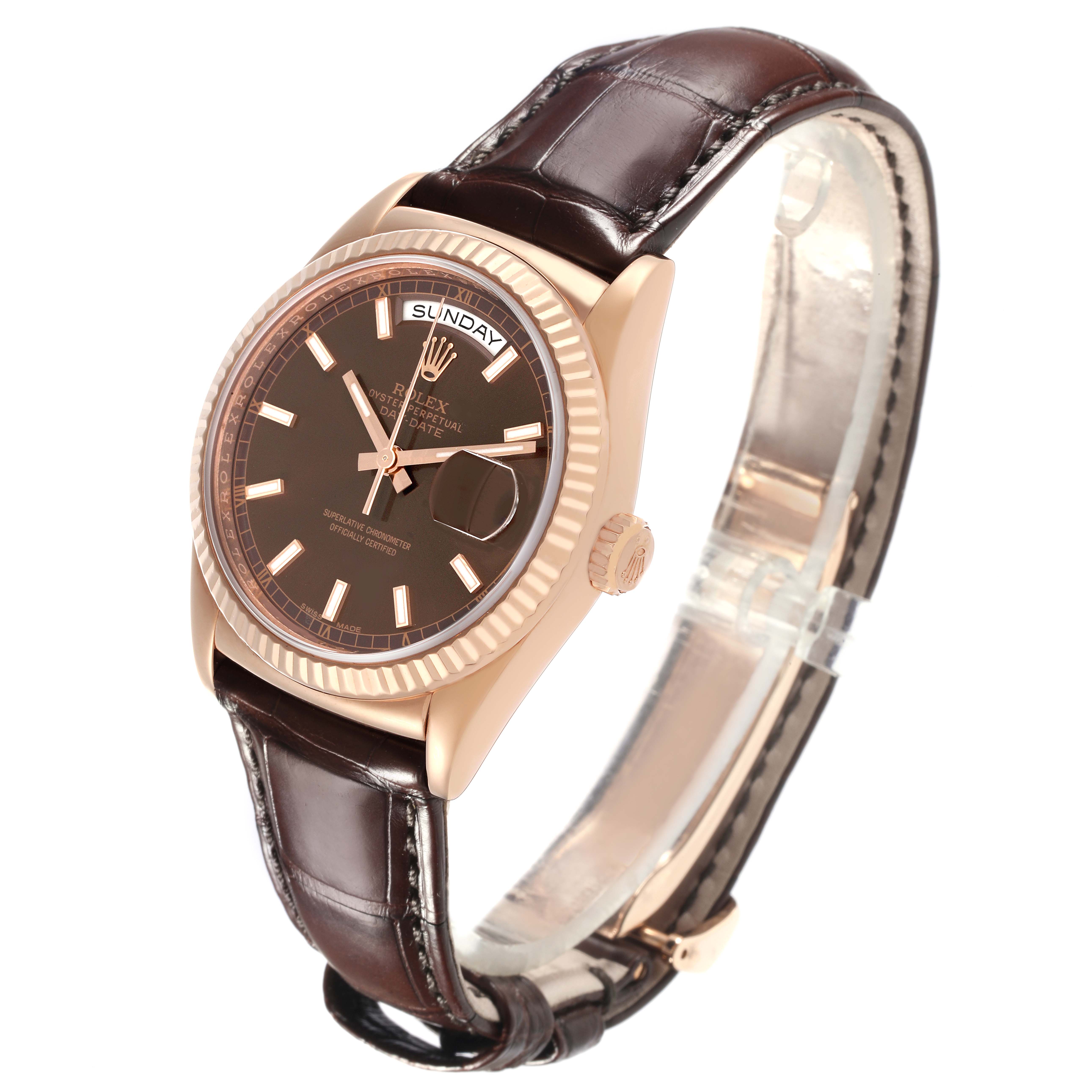 The image shows a side-front angle of a Rolex President 118135 Men
s Rose Gold Brown Dial 118135 Men
s Rose Gold Brown Dial model watch, highlighting the dial, case, and leather strap.