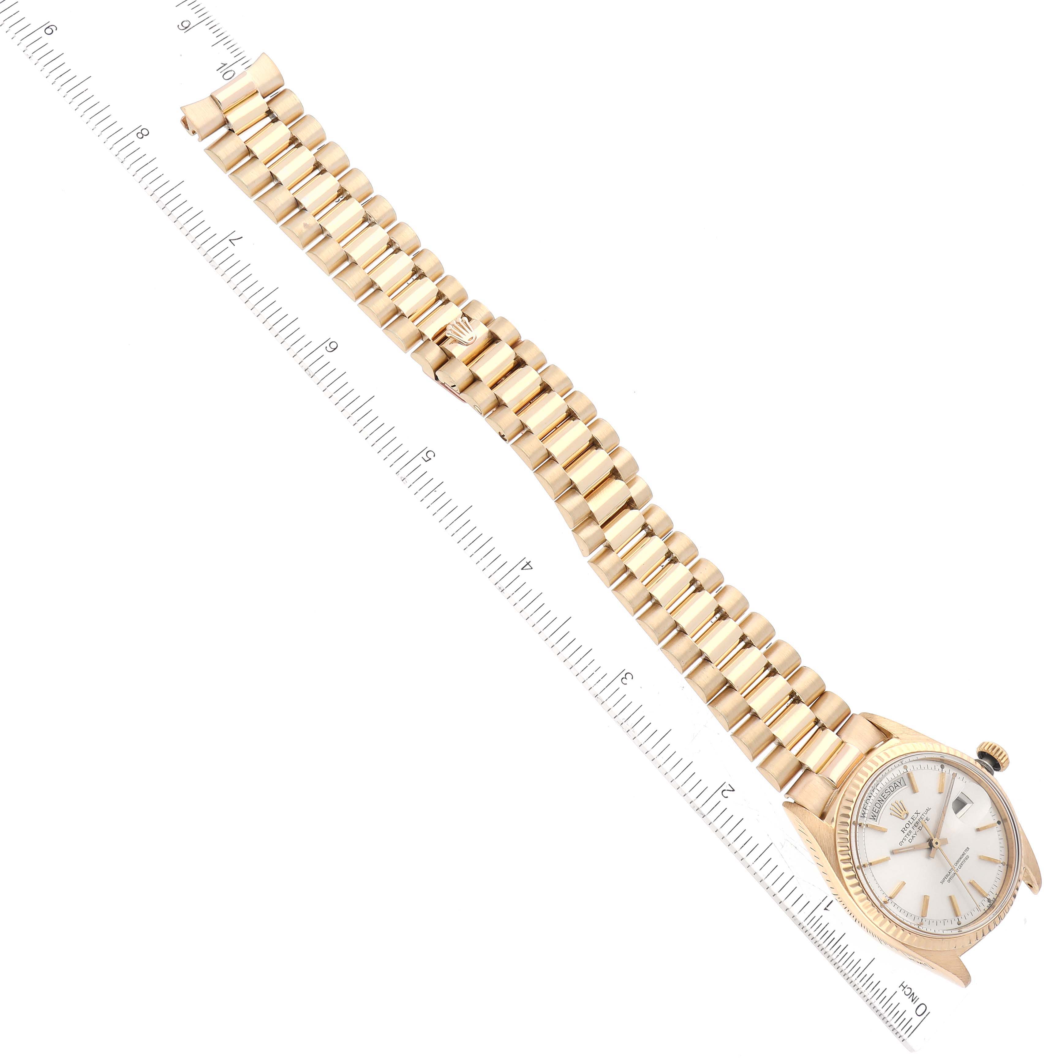 The image shows a top view of a Rolex Vintage Collection 1803 Men's Yellow Gold Silver Dial 1803 Men's Yellow Gold Silver Dial watch, displaying its face, case, and full bracelet.