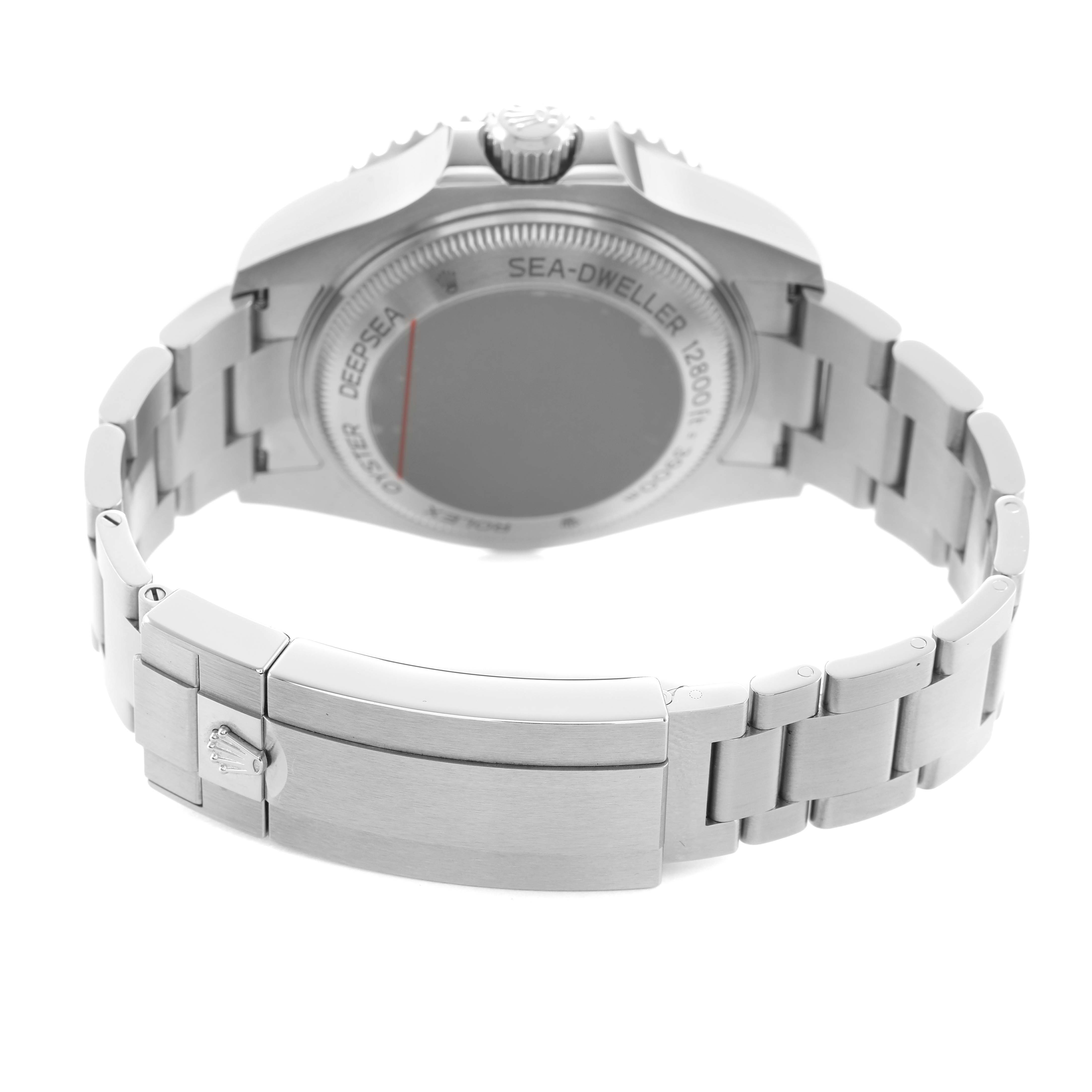 The image shows the Rolex Sea-Dweller 126660 Men's Stainless Steel Black Dial watch from the back, highlighting the case back and bracelet clasp.