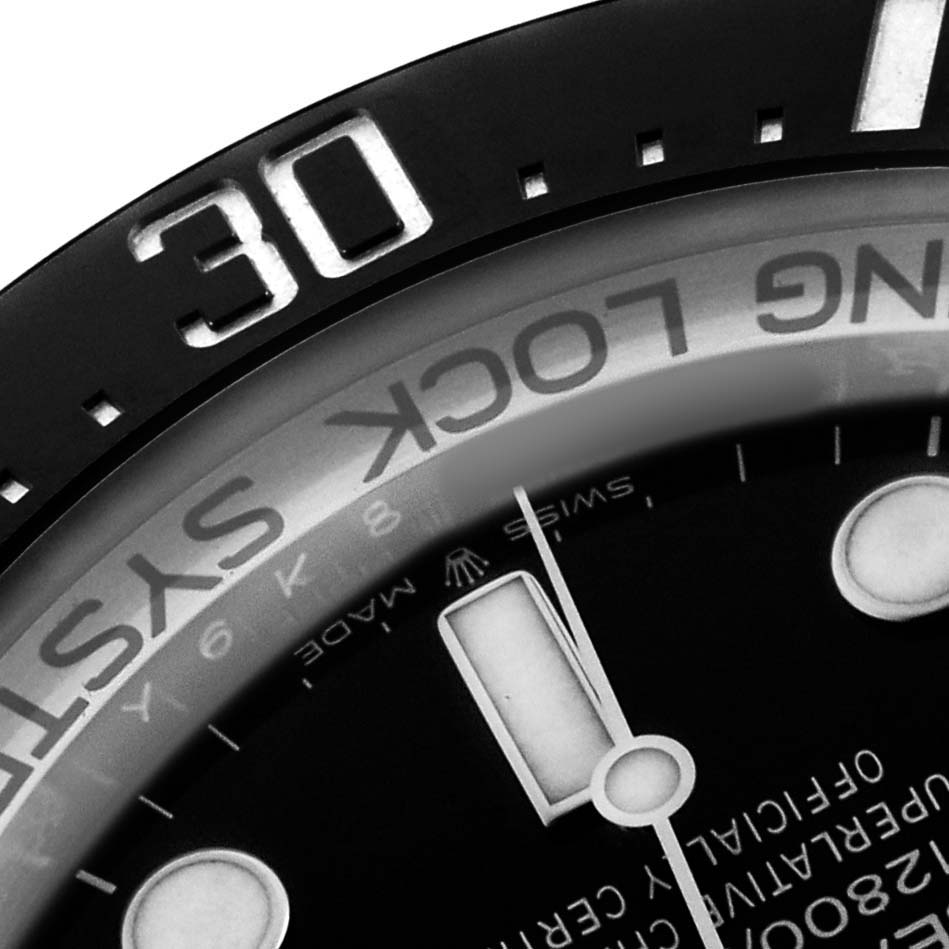 The image shows a close-up of the bezel and dial of the Rolex Sea-Dweller 126660 Men's Stainless Steel Black Dial, focusing on the "30" mark and part of the watch face.