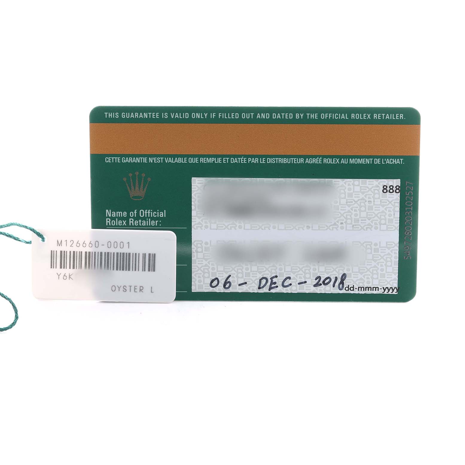 The image shows a warranty card and a tag for the Rolex Sea-Dweller 126660 Men's Stainless Steel Black Dial, with model and date details visible.