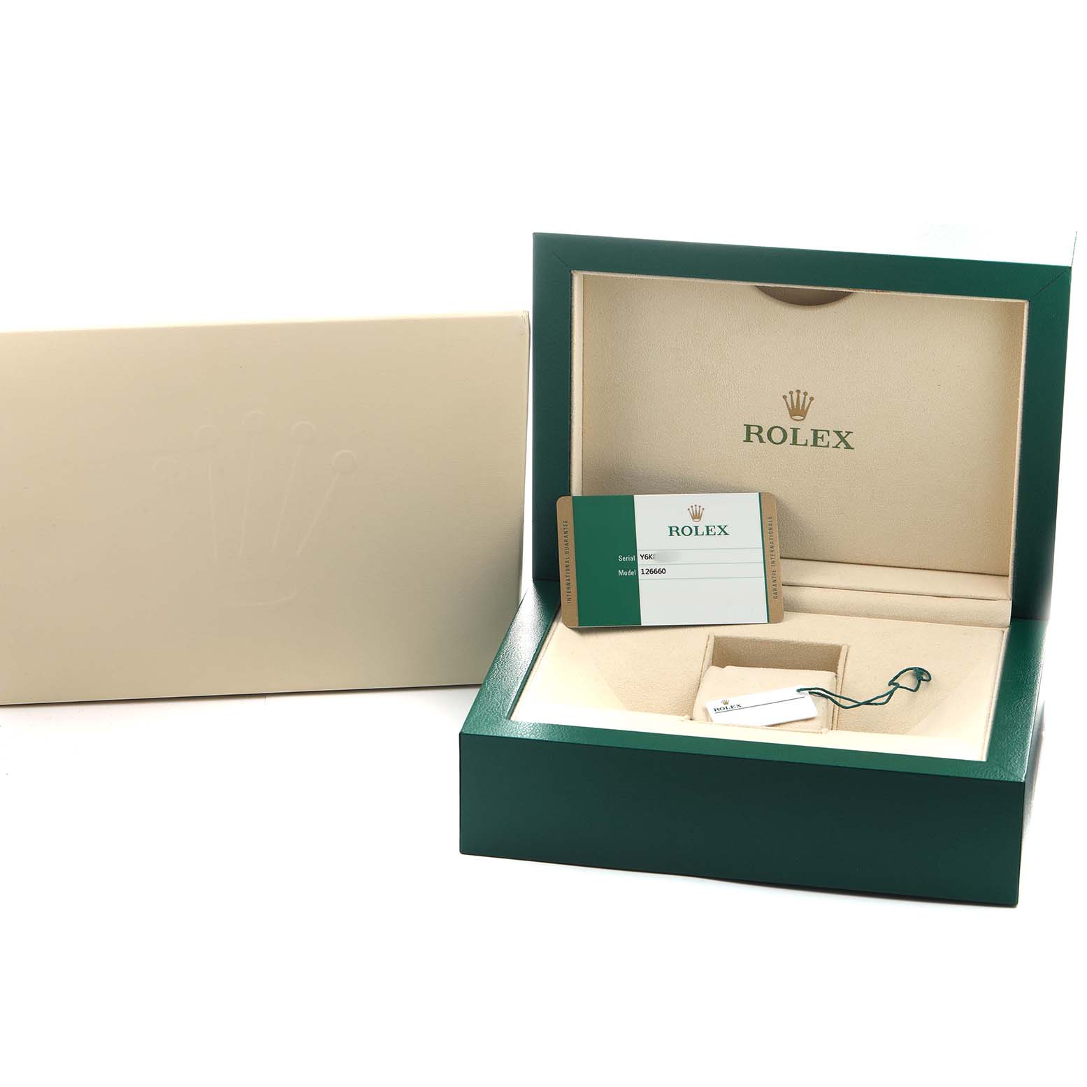 The Rolex Sea-Dweller 126660 Men's Stainless Steel Black Dial box is shown open, displaying the warranty card and hang tag, with the outer box beside it.