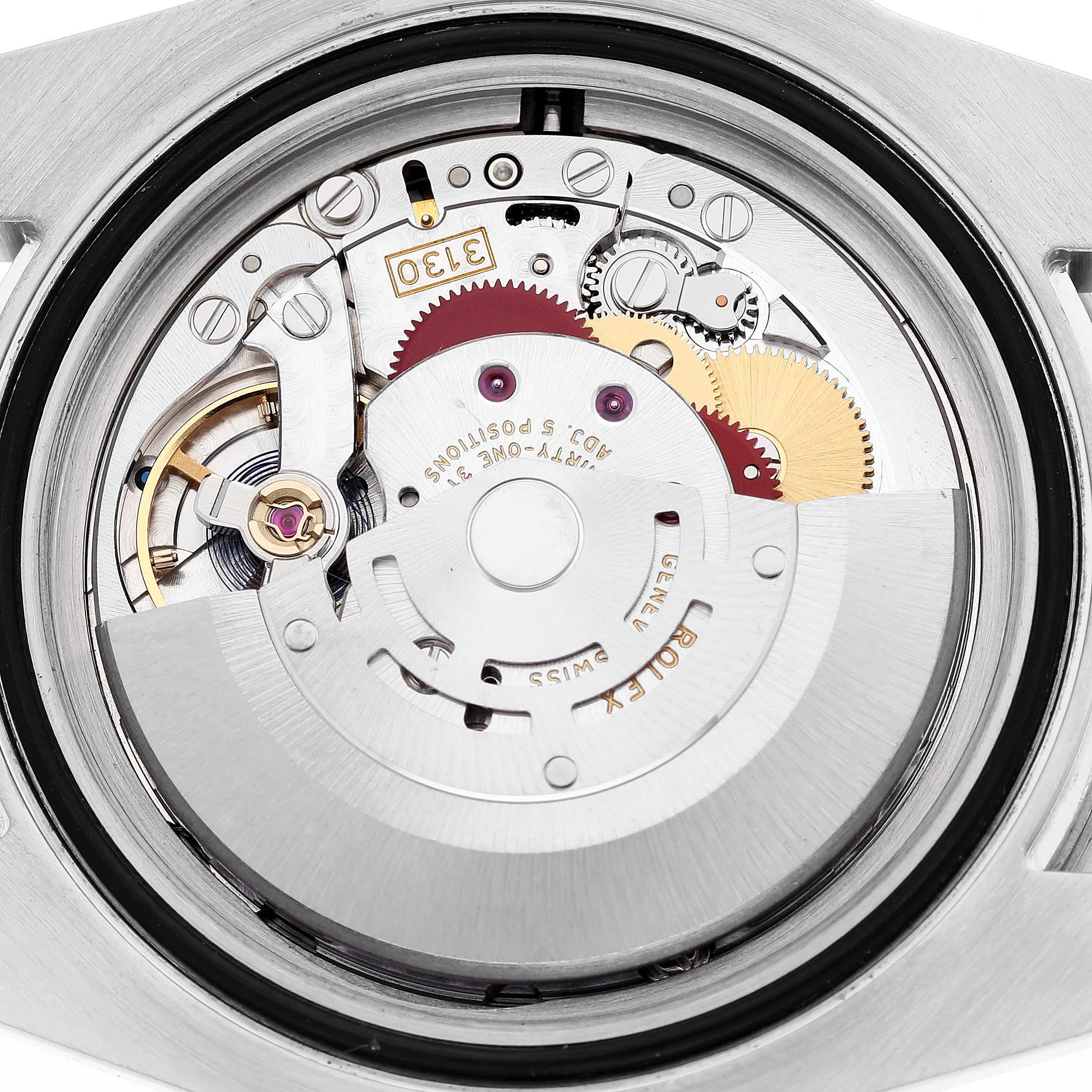 The image shows a close-up view of the internal mechanical movement of a Rolex Submariner 114060 Men's Stainless Steel Black Dial 114060 Men's Stainless Steel Black Dial watch.