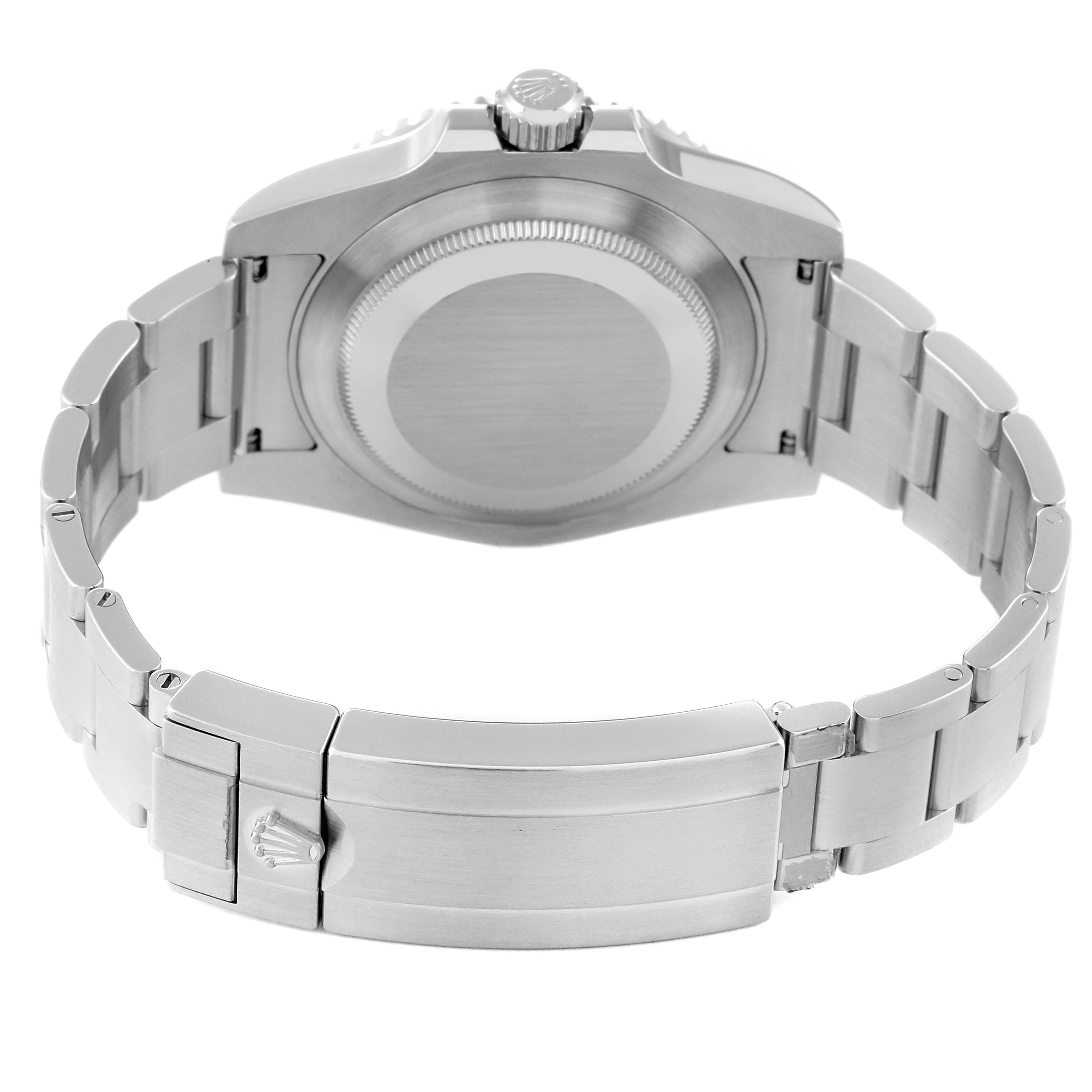 The image shows the back view of a Rolex Submariner 114060 Men
s Stainless Steel Black Dial 114060 Men
s Stainless Steel Black Dial watch, highlighting the case back and the clasp of the metal bracelet.