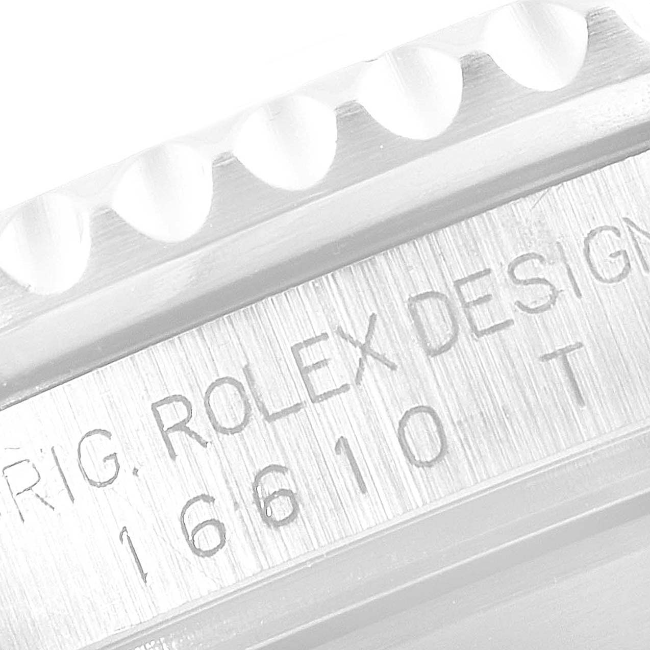 This image shows a close-up angle of the bezel and engraved model number (16610) on a Rolex Submariner 16610 Men
s Stainless Steel Black Dial 16610 Men
s Stainless Steel Black Dial watch.