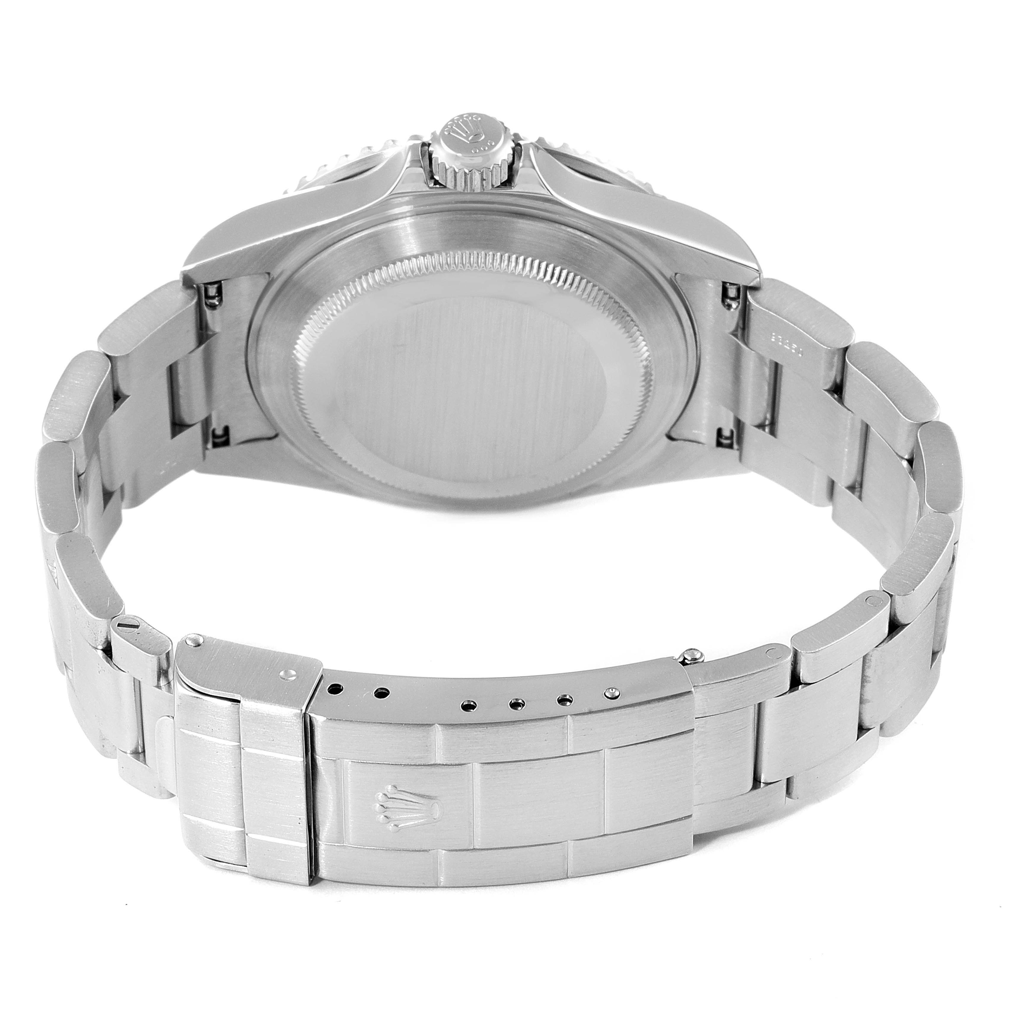 The image shows the back and clasp of a Rolex Submariner 16610LV Men
s Stainless Steel Black Dial 16610LV Men
s Stainless Steel Black Dial watch, featuring the stainless steel bracelet and the case back.