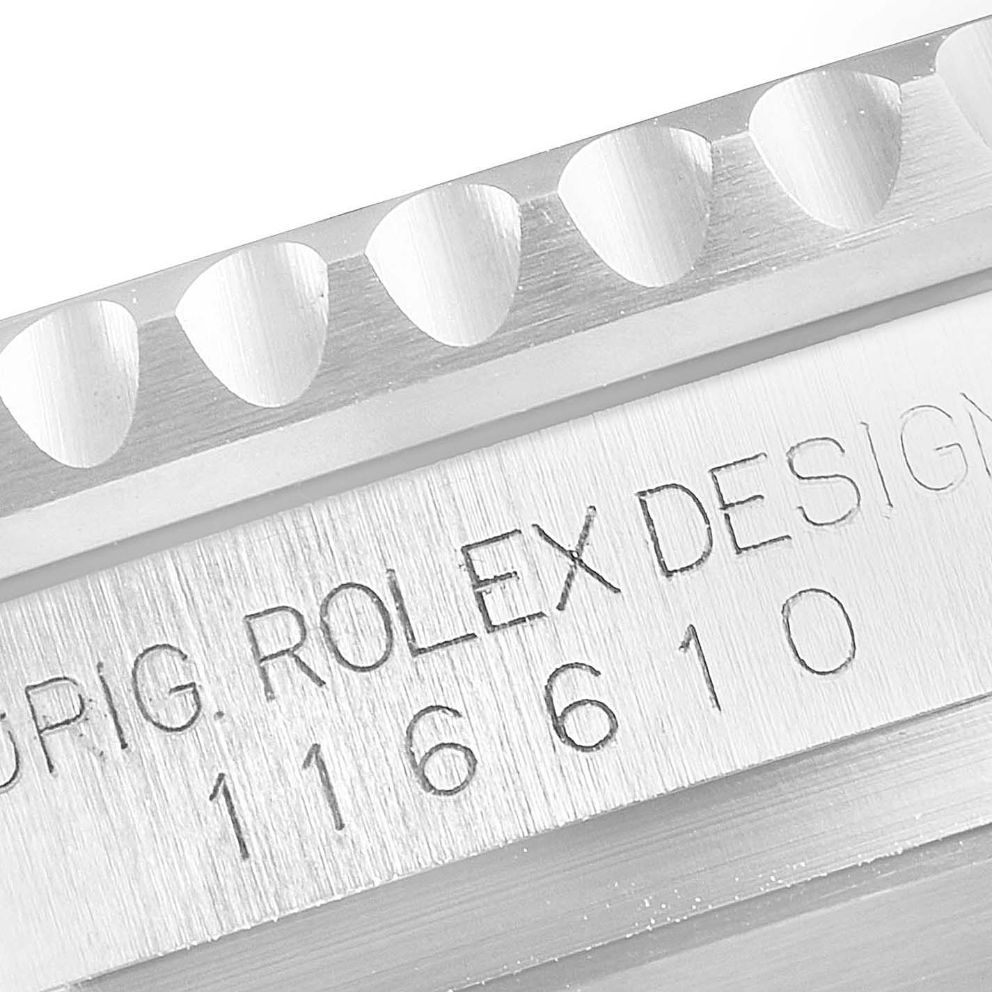 This close-up image shows part of the bezel and engraved side of the Rolex Submariner 116610LV Men
s Stainless Steel Green Dial 116610LV Men
s Stainless Steel Green Dial 116610.