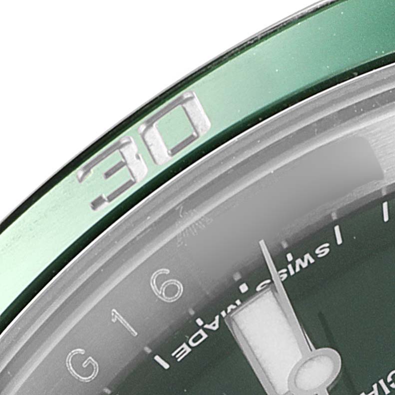 This is a close-up angle of a Rolex Submariner 116610LV Men
s Stainless Steel Green Dial 116610LV Men
s Stainless Steel Green Dial watch, showing part of the bezel and the dial with the "30" mark.