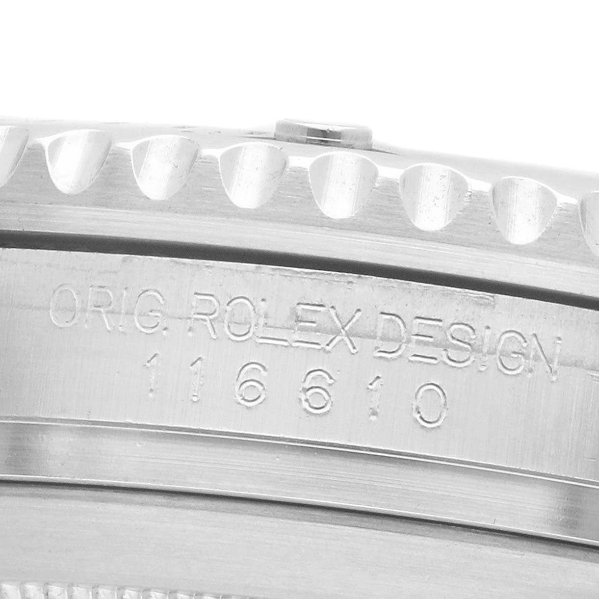 The image shows a close-up angle of the side of a Rolex Submariner 116610LV Men's Stainless Steel Green Dial, highlighting the engraved model number "116610."