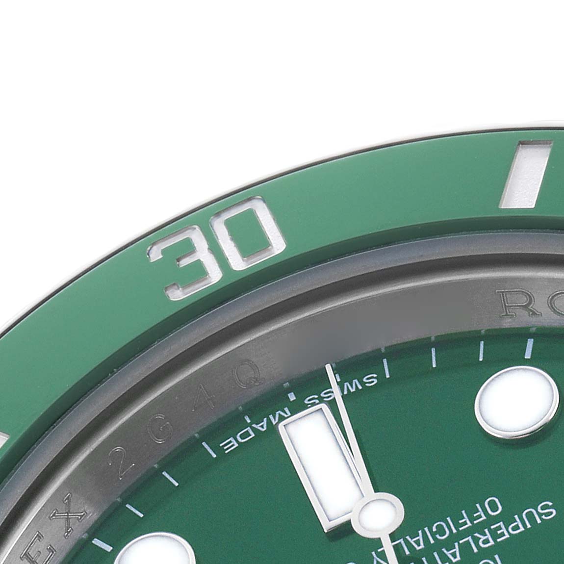 The image shows a close-up of the bezel and dial of a Rolex Submariner 116610LV Men's Stainless Steel Green Dial watch, highlighting the number "30" and part of the green dial.