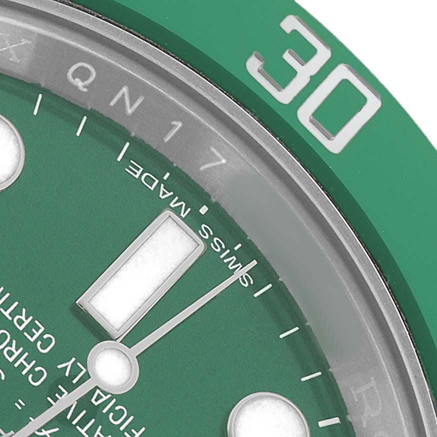 The image shows a close-up of the dial and bezel on a Rolex Submariner 116610LV Men's Stainless Steel Green Dial, focusing on the "30" marker and part of the dial.