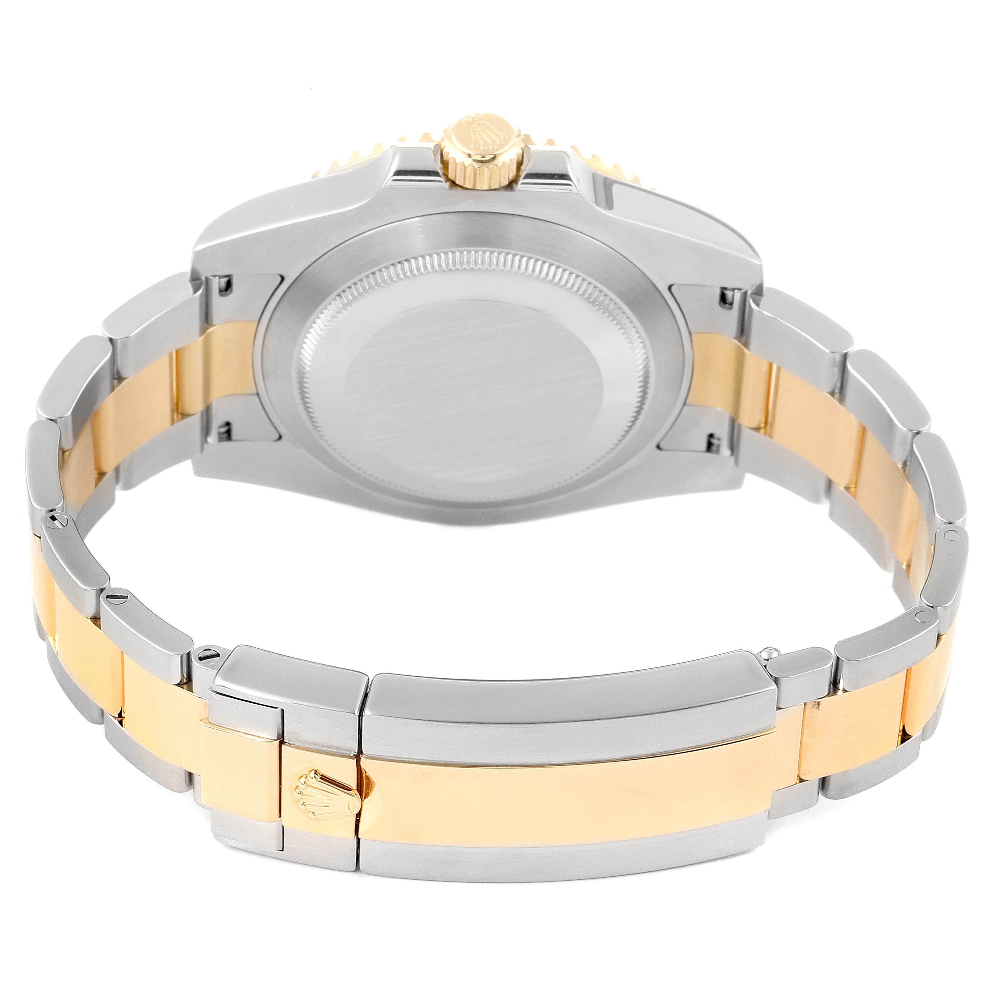 The image shows the case back and bracelet of a Rolex Submariner 116613 Men's Steel and Gold (two tone) Blue Dial 116613 Men's Steel and Gold (two tone) Blue Dial watch from a rear angle.