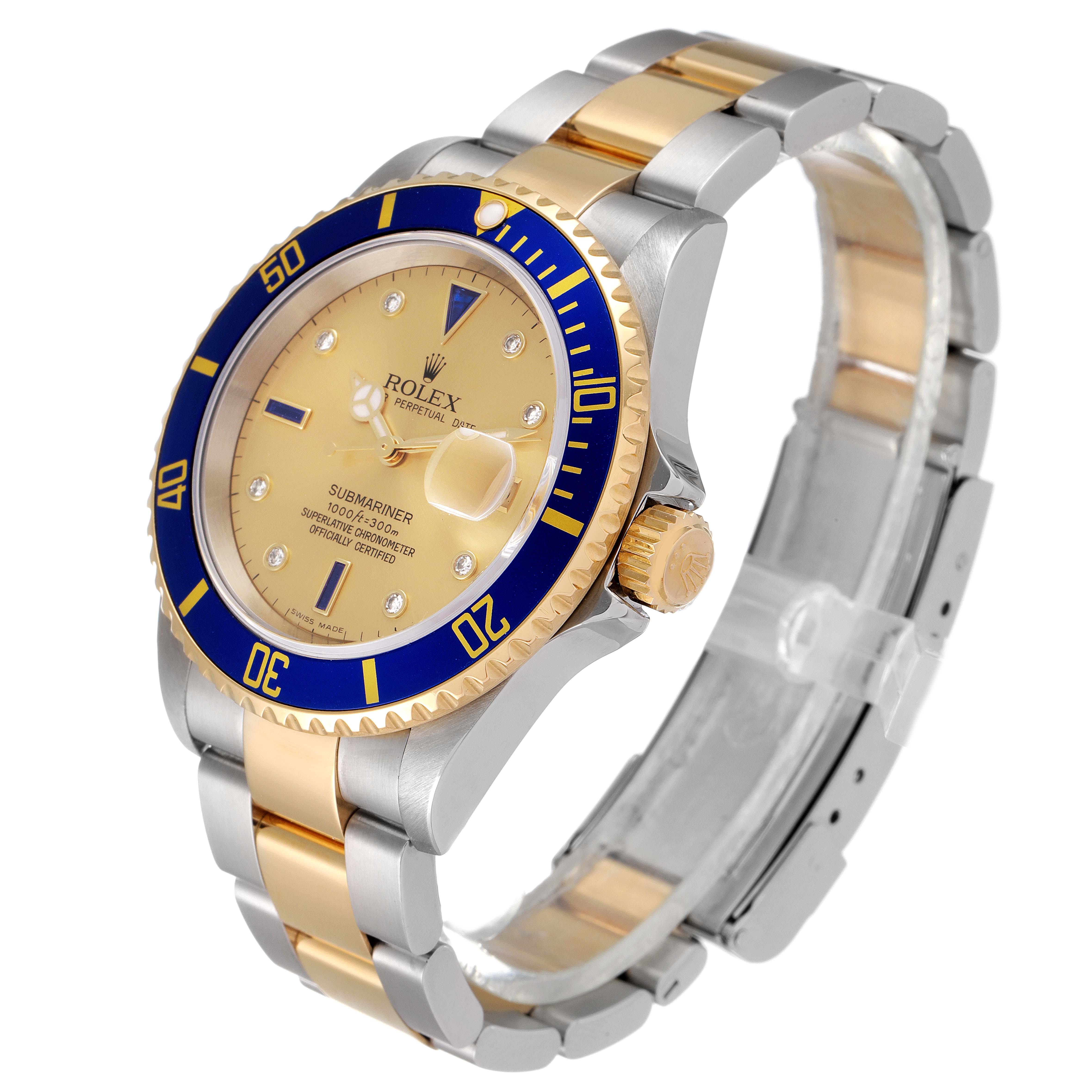 The Rolex Submariner 16613 Men's Steel and Gold (two tone) Champagne Dial 16613 Men's Steel and Gold (two tone) Champagne Dial watch is shown at a slight angle, highlighting the face, bezel, crown, and a portion of the bracelet.