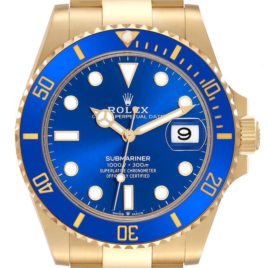 The image shows a front view of the Rolex Submariner watch, highlighting the blue dial, date window, and bezel.