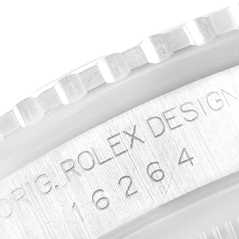 This close-up image of a Rolex Turn-o-Graph 16264 Men's Stainless Steel Black Dial 16264 Men's Stainless Steel Black Dial model shows part of the bezel and engraved case back with model number 16264.