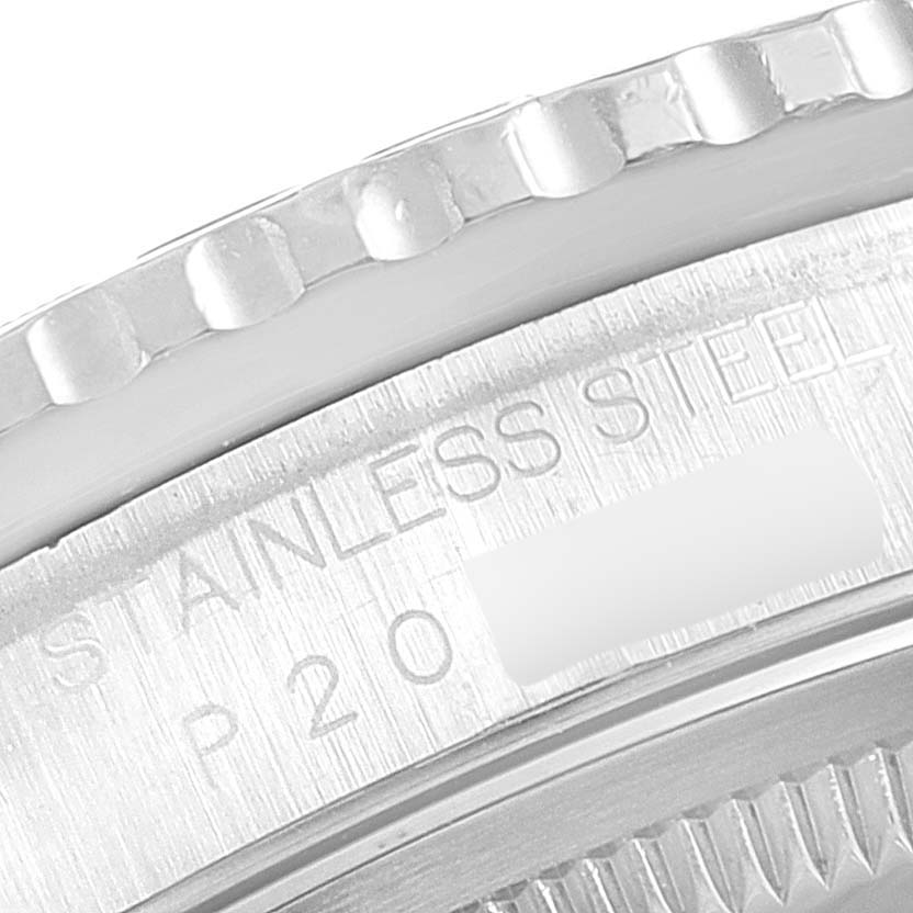 This close-up image shows the partial bezel and "Stainless Steel" engraving on a Rolex Turn-o-Graph 16264 Men's Stainless Steel Black Dial 16264 Men's Stainless Steel Black Dial watch.