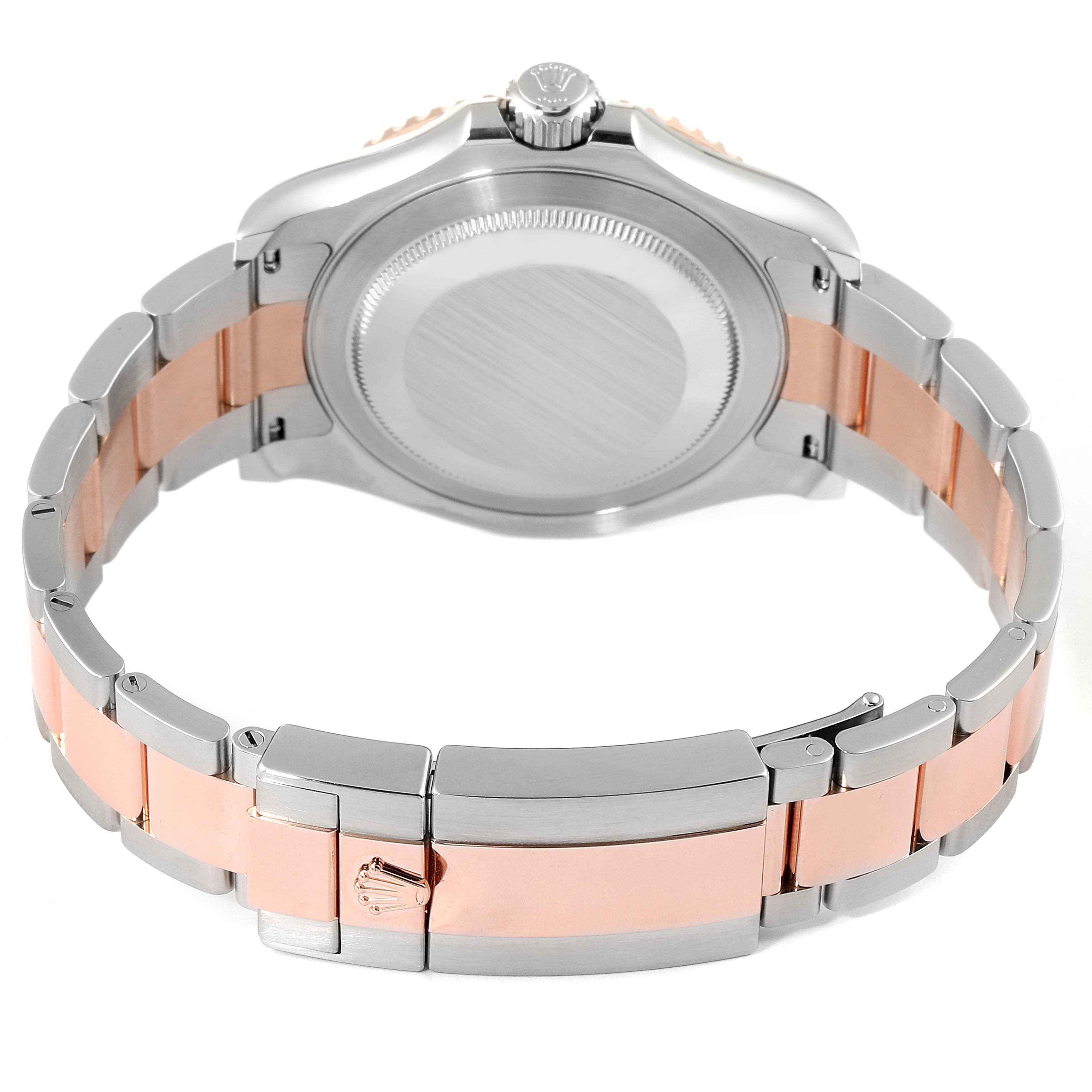 This image shows the back of a Rolex Yacht-Master 126621 Men's Rose Gold Black Dial 126621 Men's Rose Gold Black Dial watch, highlighting the case back and two-tone bracelet.