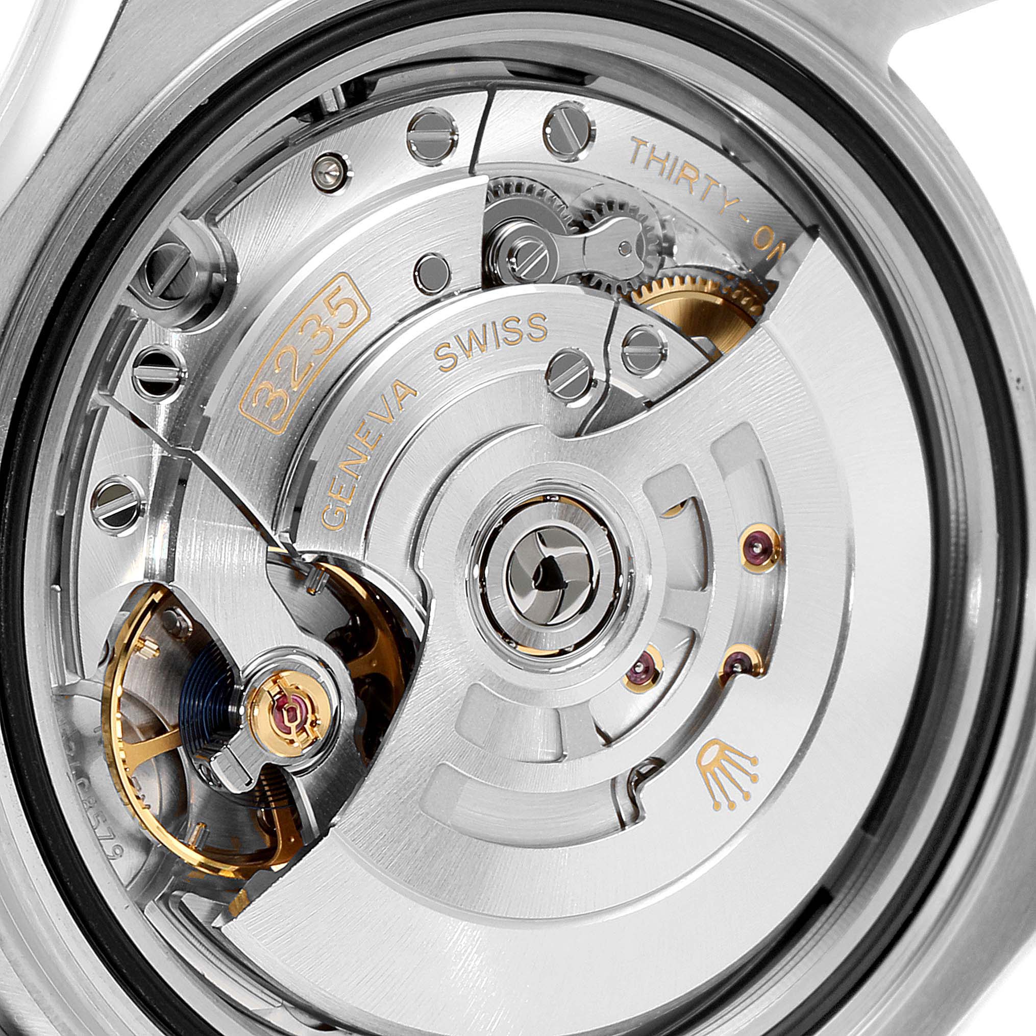 The image shows the movement and intricate mechanics of the Rolex Yacht-Master 126621 Men's Rose Gold Black Dial 126621 Men's Rose Gold Black Dial watch from the back.