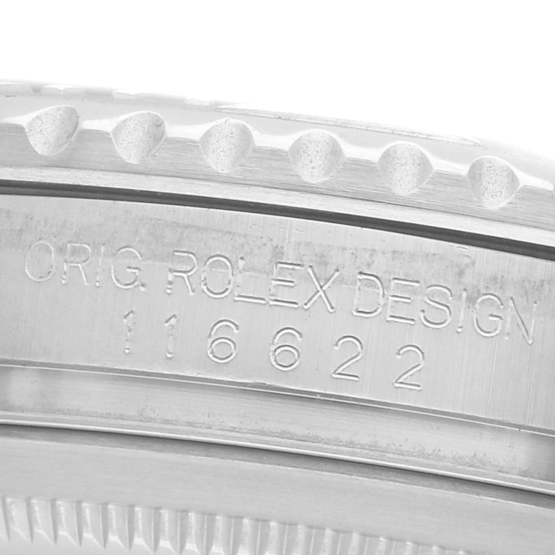 The image shows a close-up of the side of a Rolex Yacht-Master 116622 Men's Stainless Steel Blue Dial watch, focusing on the engraved model number "116622" and the bezel edge.