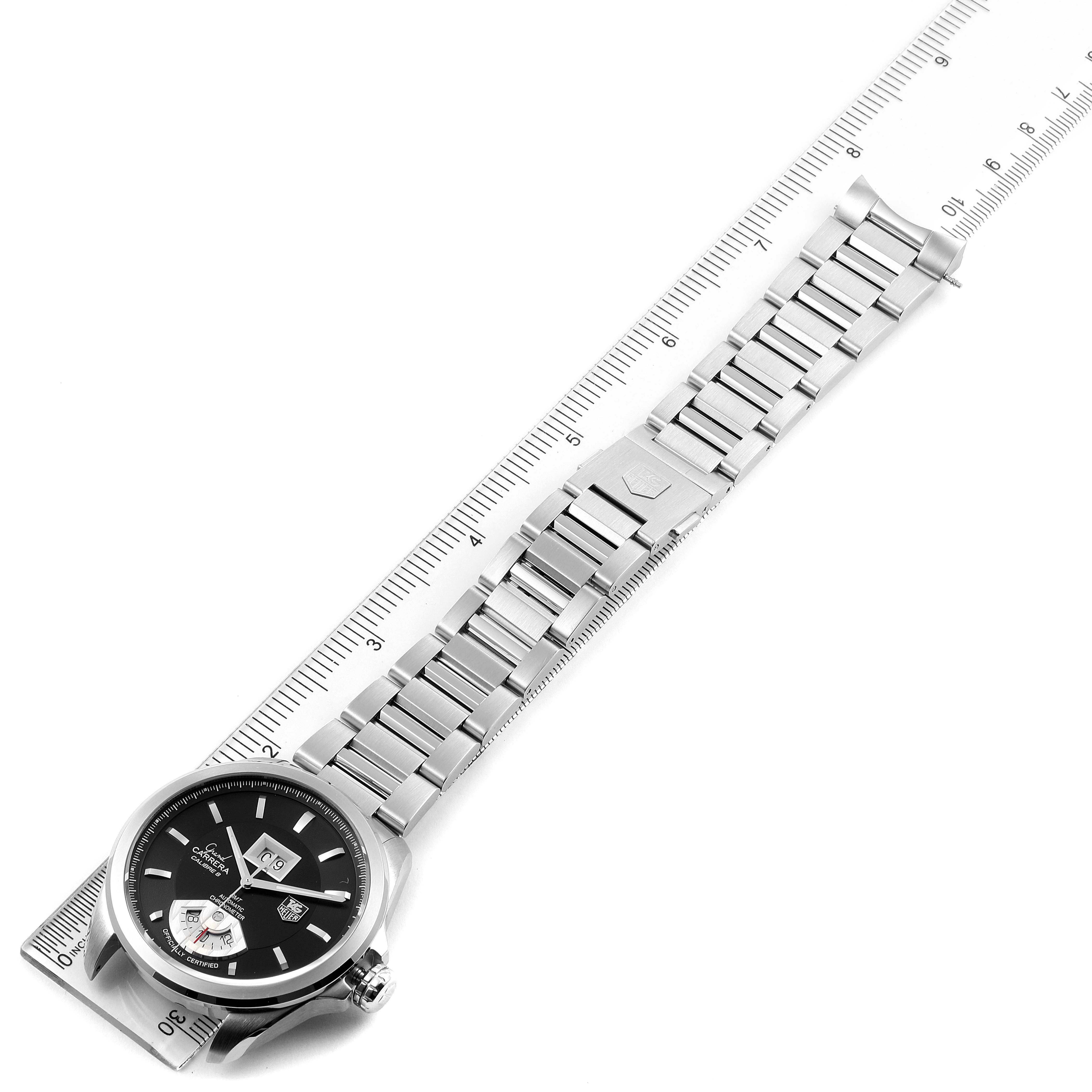 The Tag Heuer Carrera WAV5111.BA0901 Men
s Stainless Steel Black Dial WAV5111.BA0901 Men
s Stainless Steel Black Dial watch is shown from the top perspective with its full metal strap measured using a ruler.