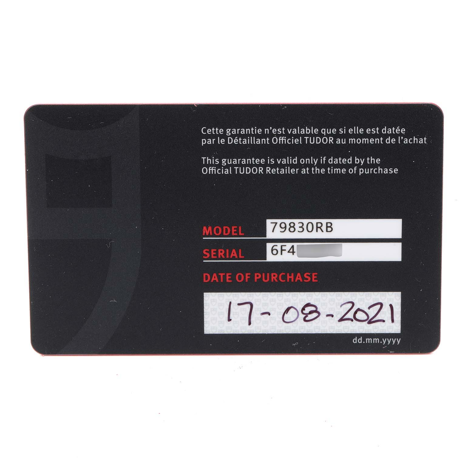 This image shows the warranty card for the Tudor Heritage Black Bay 79830RB Men's Stainless Steel Black Dial 79830RB Men's Stainless Steel Black Dial model 79830RB, including the serial number and purchase date.