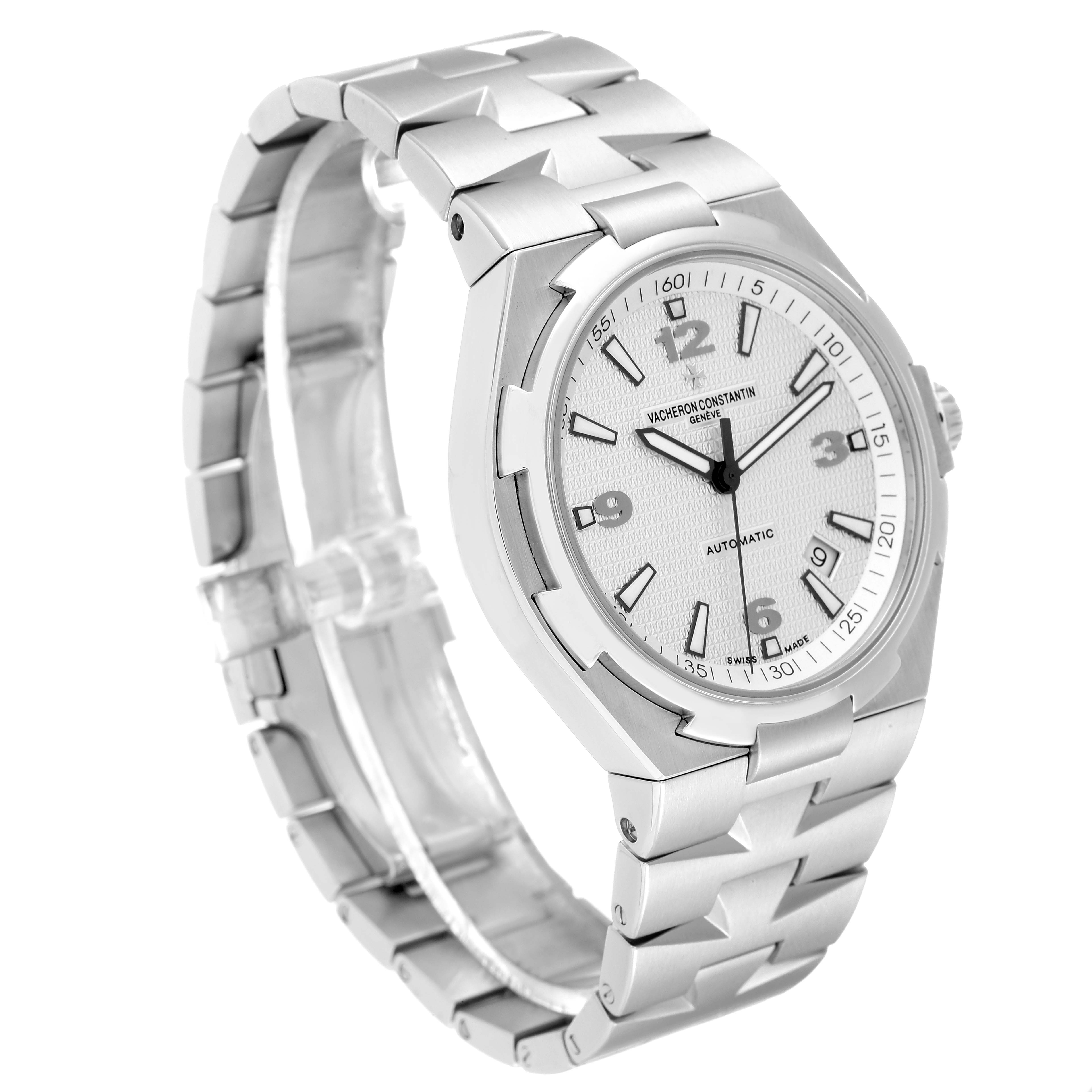 The image shows the Vacheron Constantin Overseas 47040 Men's Stainless Steel Silver Dial 47040 Men's Stainless Steel Silver Dial model watch from a front-left angle, highlighting the dial and metal bracelet.