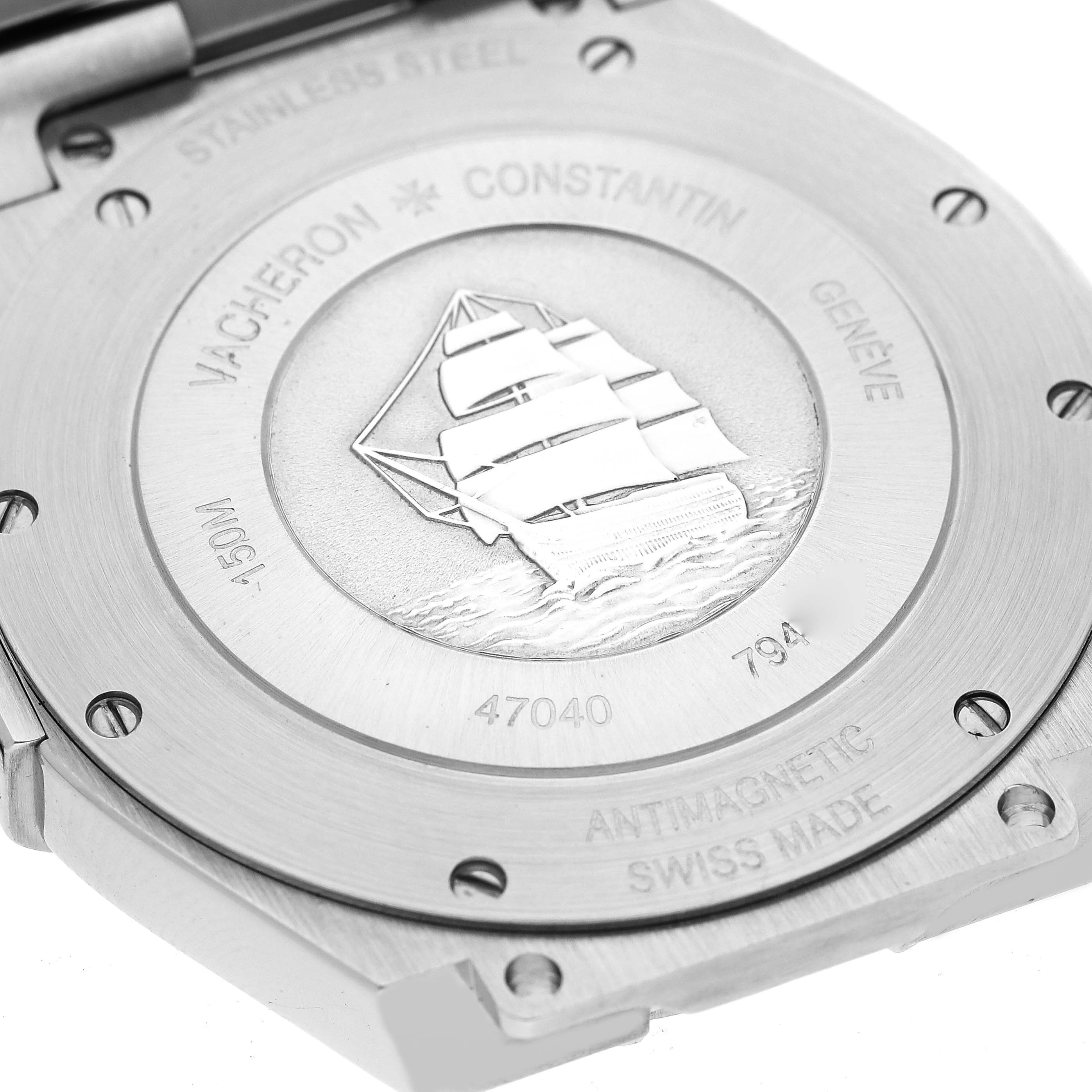This image shows the engraved case back of a Vacheron Constantin Overseas 47040 Men's Stainless Steel Silver Dial 47040 Men's Stainless Steel Silver Dial watch.