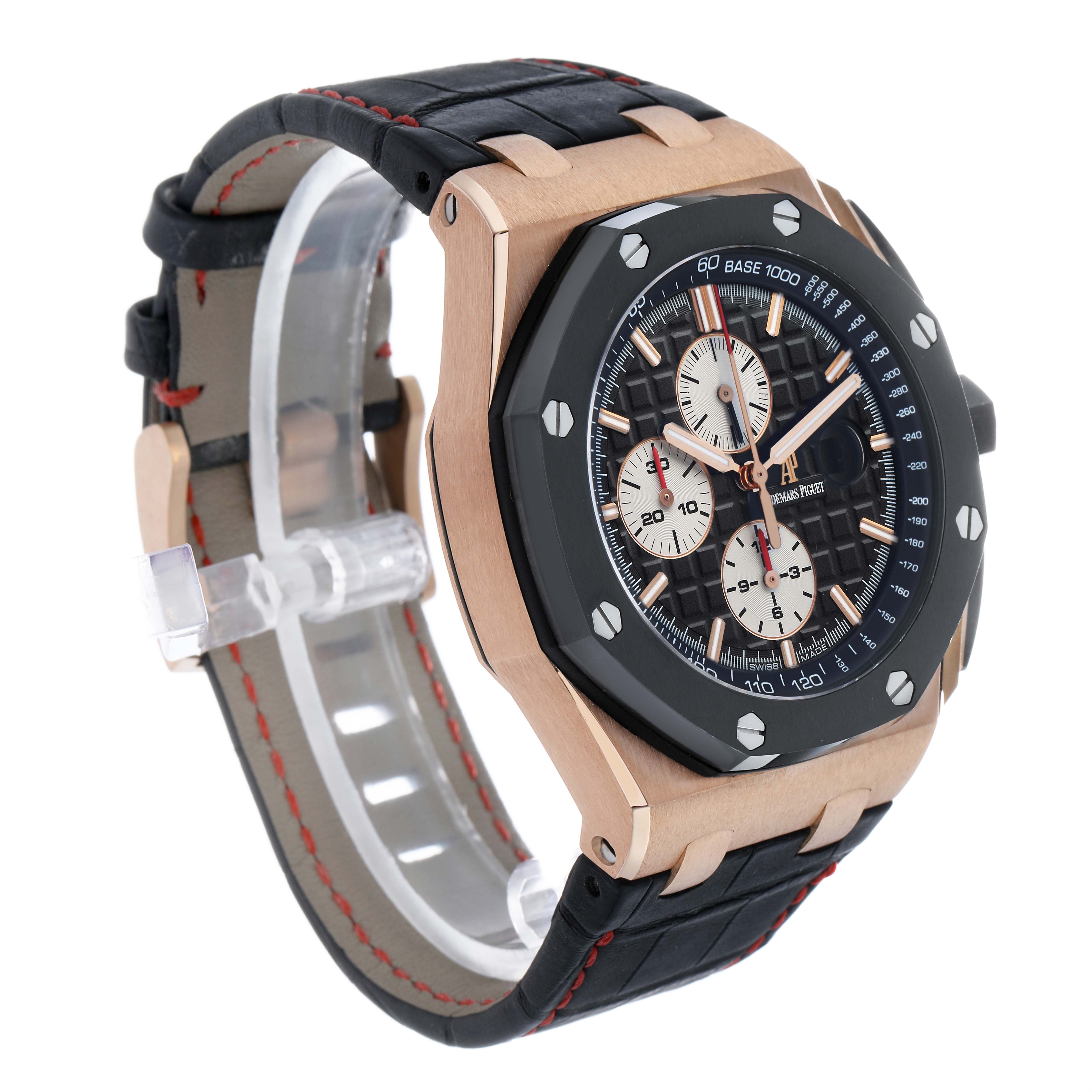 The Royal Oak Offshore by Audemars Piguet is shown at an angled side view, highlighting the bezel, chronograph dials, and strap.