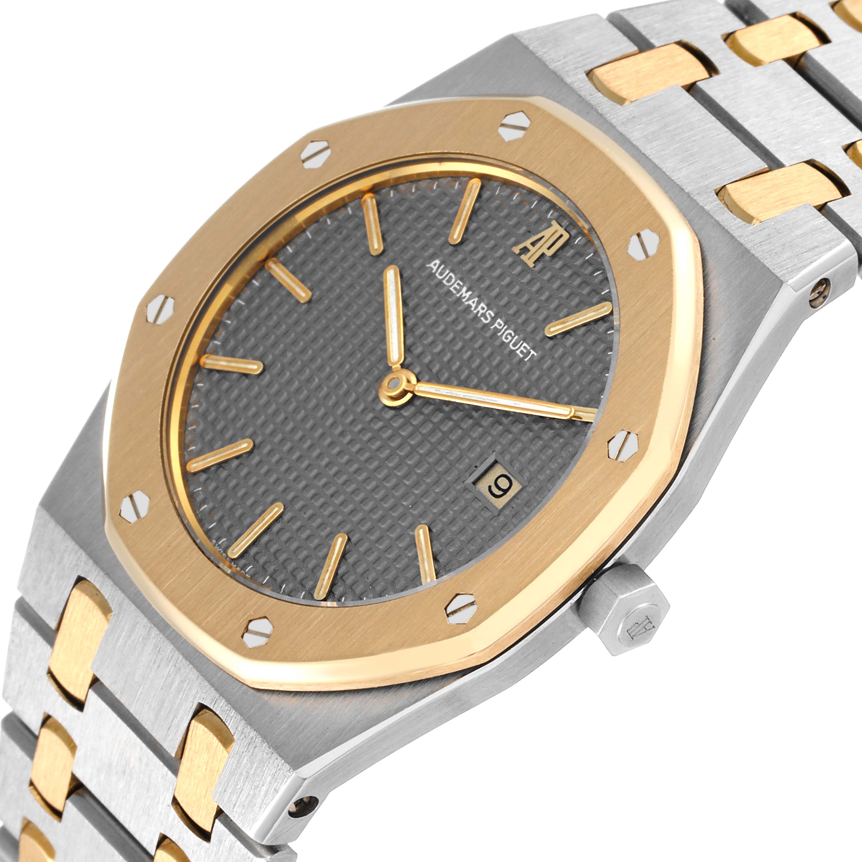 This is an angled view of the Audemars Piguet Royal Oak 56175SA.OO.0789SA.01 Men's Steel and Gold (two tone) Grey Dial 56175SA.OO.0789SA.01 Men's Steel and Gold (two tone) Grey Dial watch, showing the face, bezel, crown, and part of the bracelet.