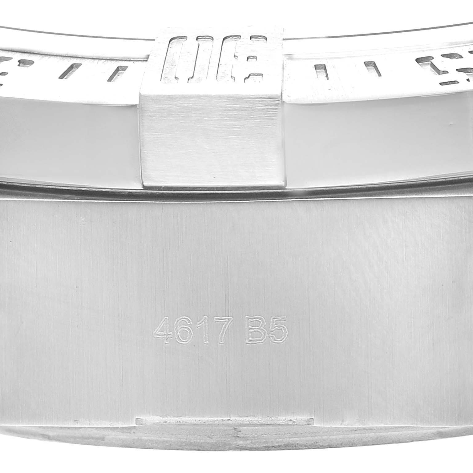 This image shows a close-up of the back casing and band of a Breitling Avenger A17331 Men's Stainless Steel Black Dial A17331 Men's Stainless Steel Black Dial watch, featuring engraved details.