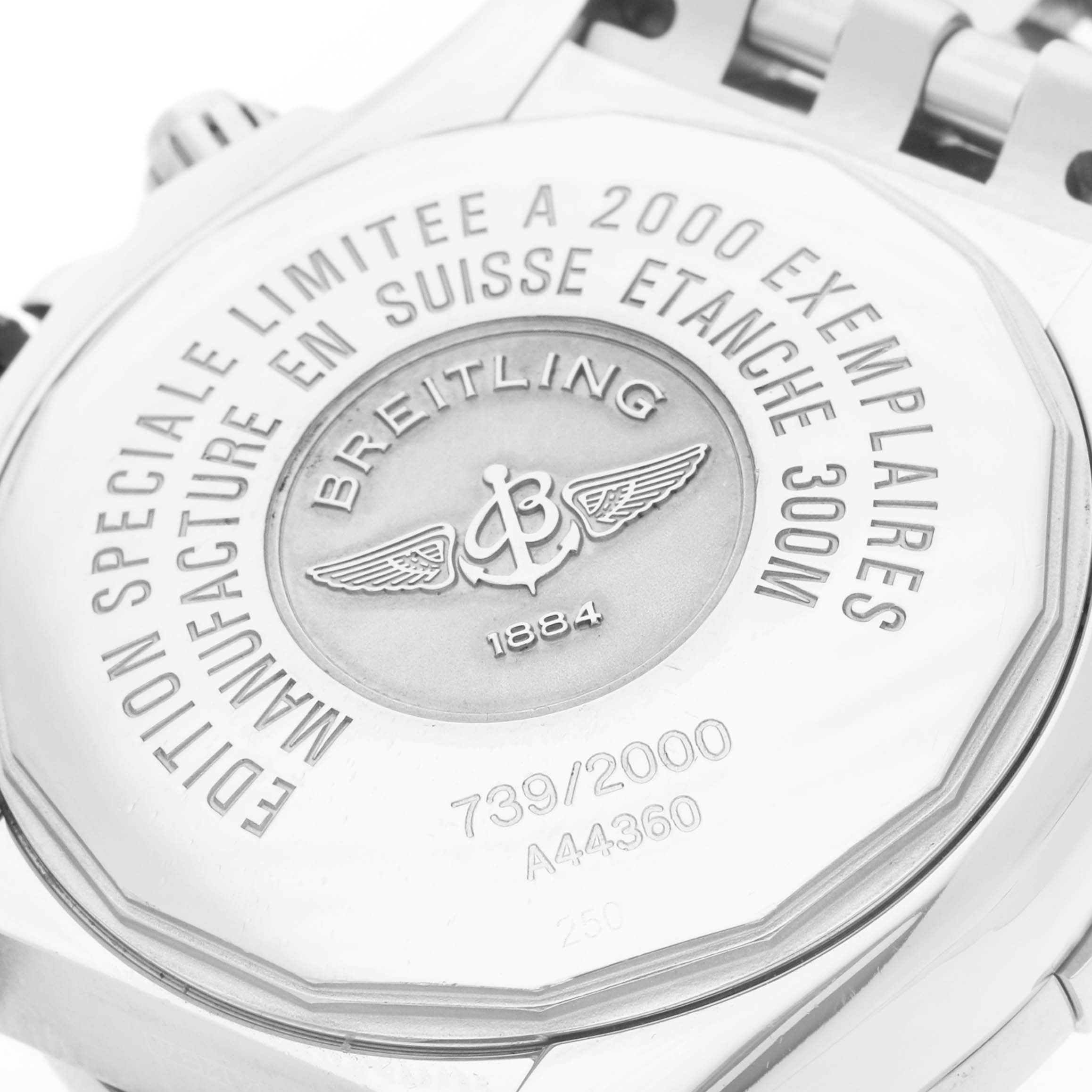 The image shows the back case of a Breitling Chronomat A44360 Men's Stainless Steel Black Dial watch with engraved branding and edition details.