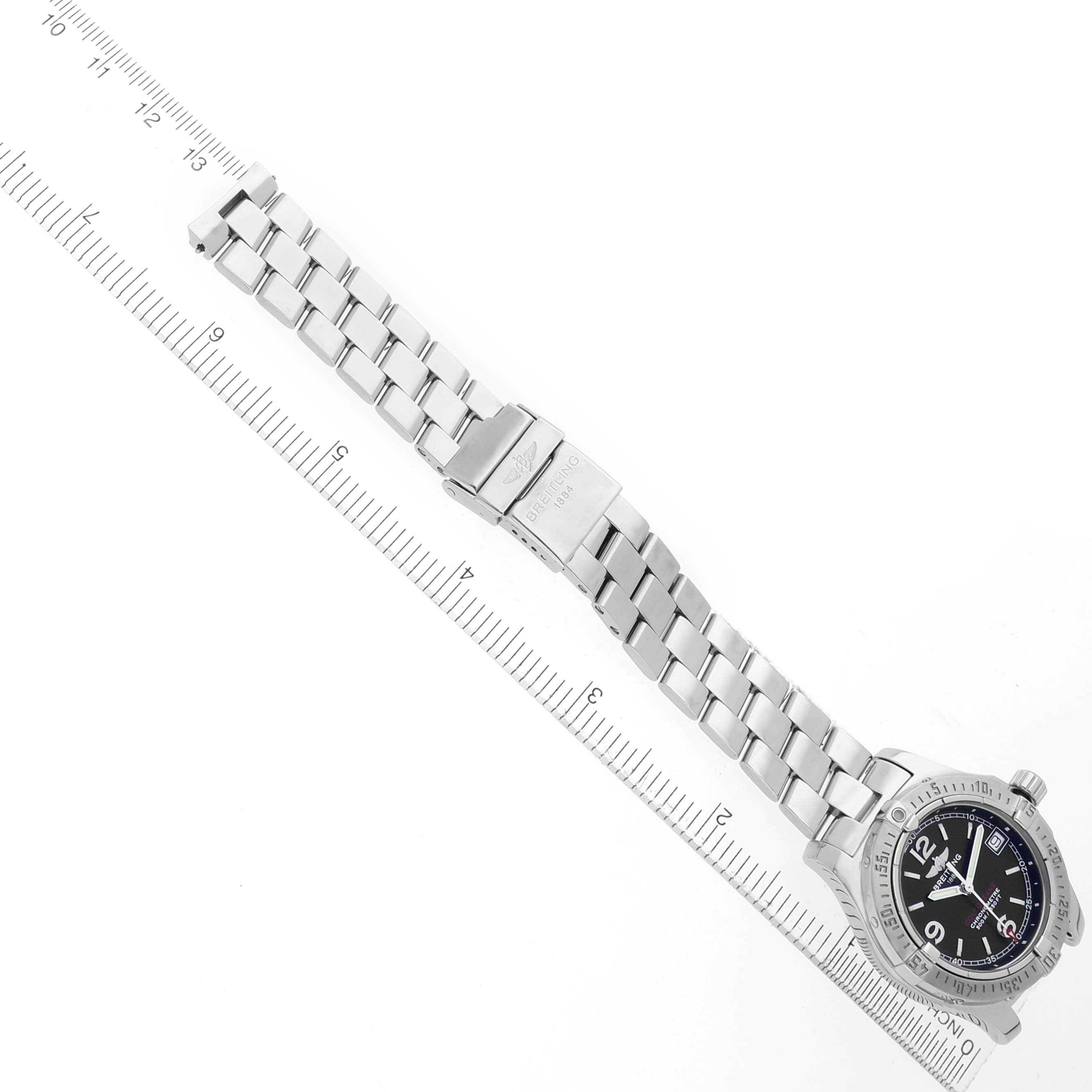 The Breitling A77380 Women's Stainless Steel Black Dial Colt Oceane 33 Stainless Steel Ladies Watch A77380 is shown from an angled top view, displaying the bracelet and dial.