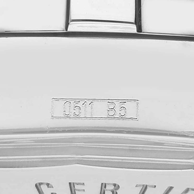 The image shows a close-up view of the back engraving on a Breitling A77380 Women's Stainless Steel Black Dial Colt Oceane 33 Stainless Steel Ladies Watch A77380.