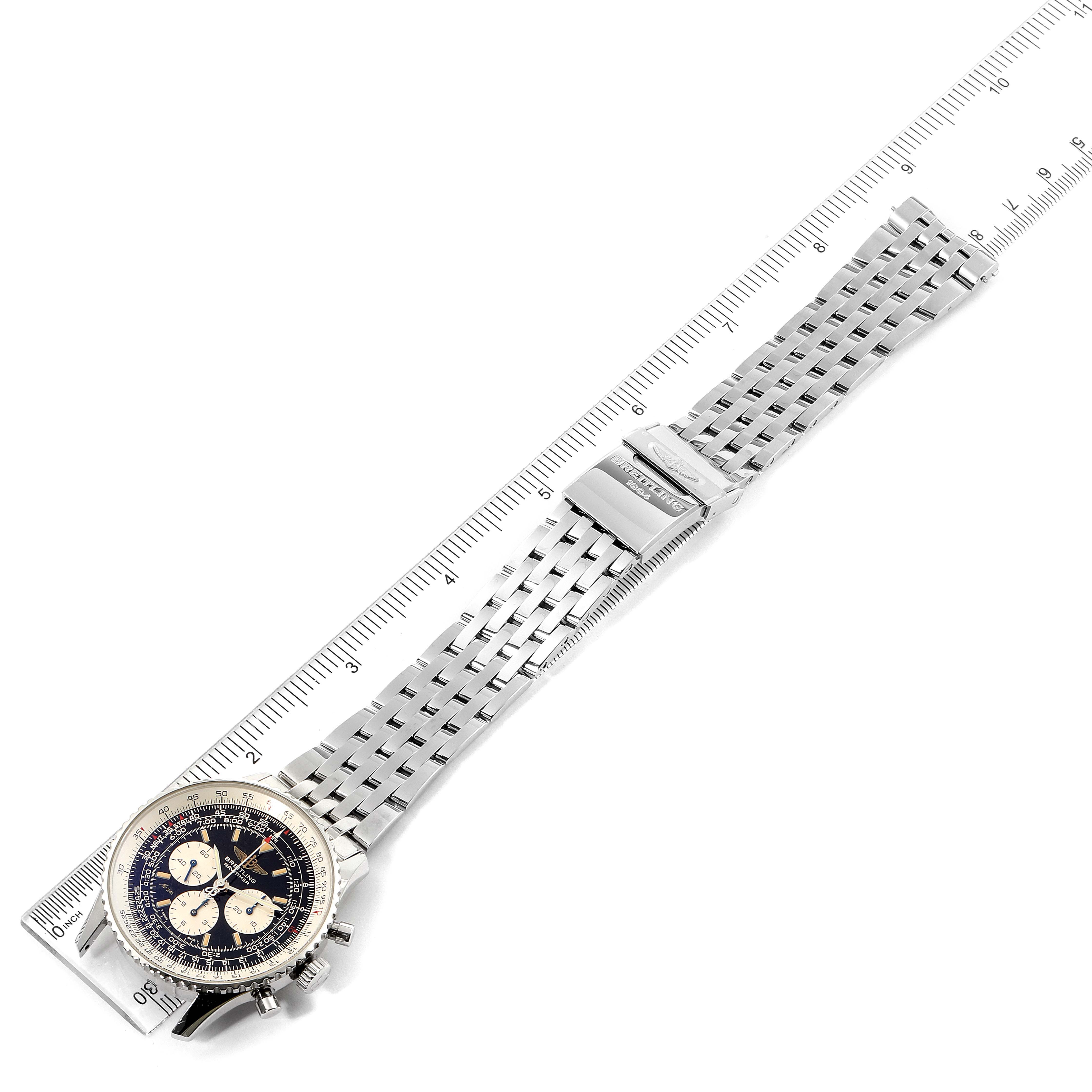 This image shows a top-down view of a Breitling Navitimer A11022 Men's Stainless Steel Black Dial A11022 Men's Stainless Steel Black Dial watch, including the face, bezel, and full metal bracelet alongside a ruler.