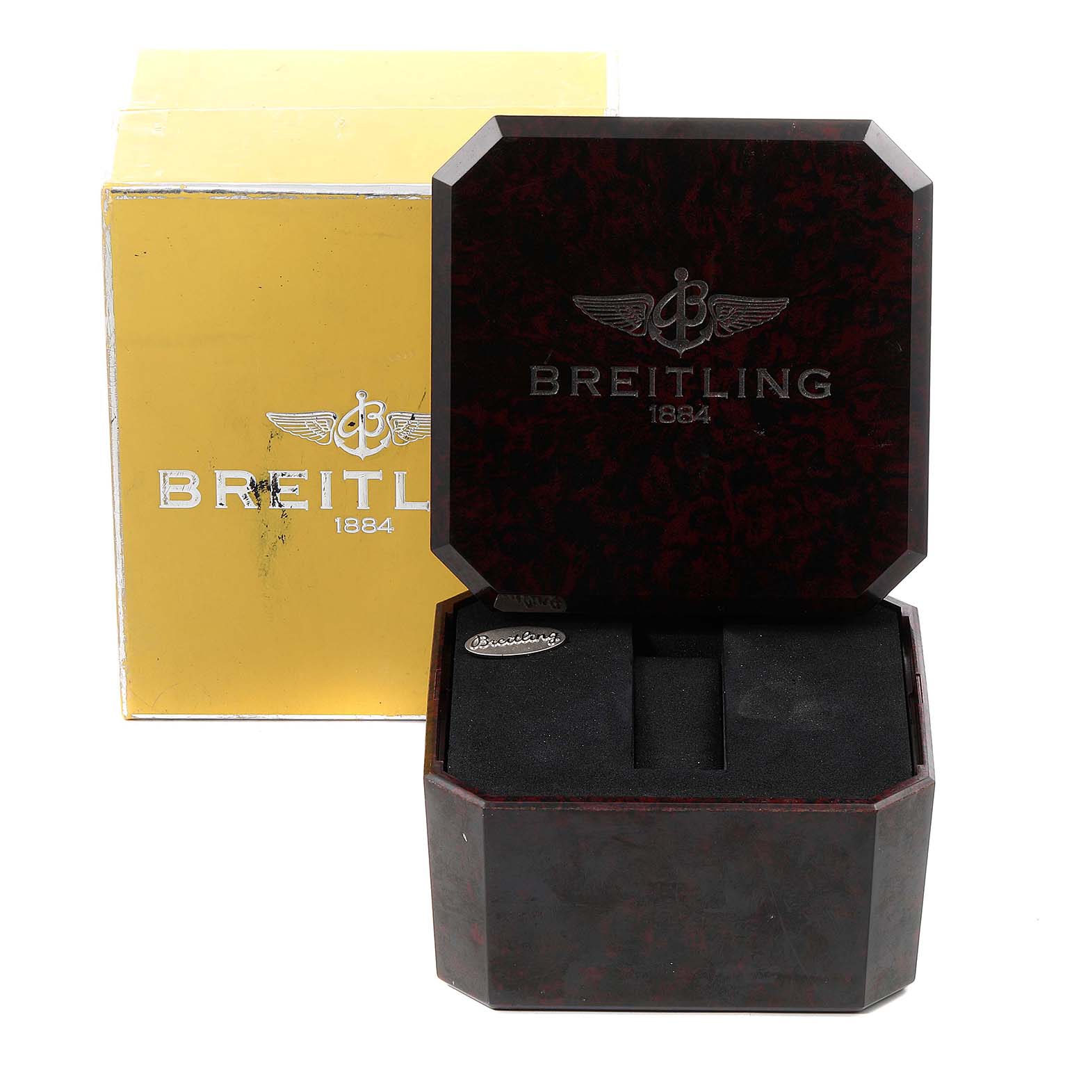 The image shows an open Breitling Navitimer A11022 Men's Stainless Steel Black Dial A11022 Men's Stainless Steel Black Dial watch box and a yellow outer box.