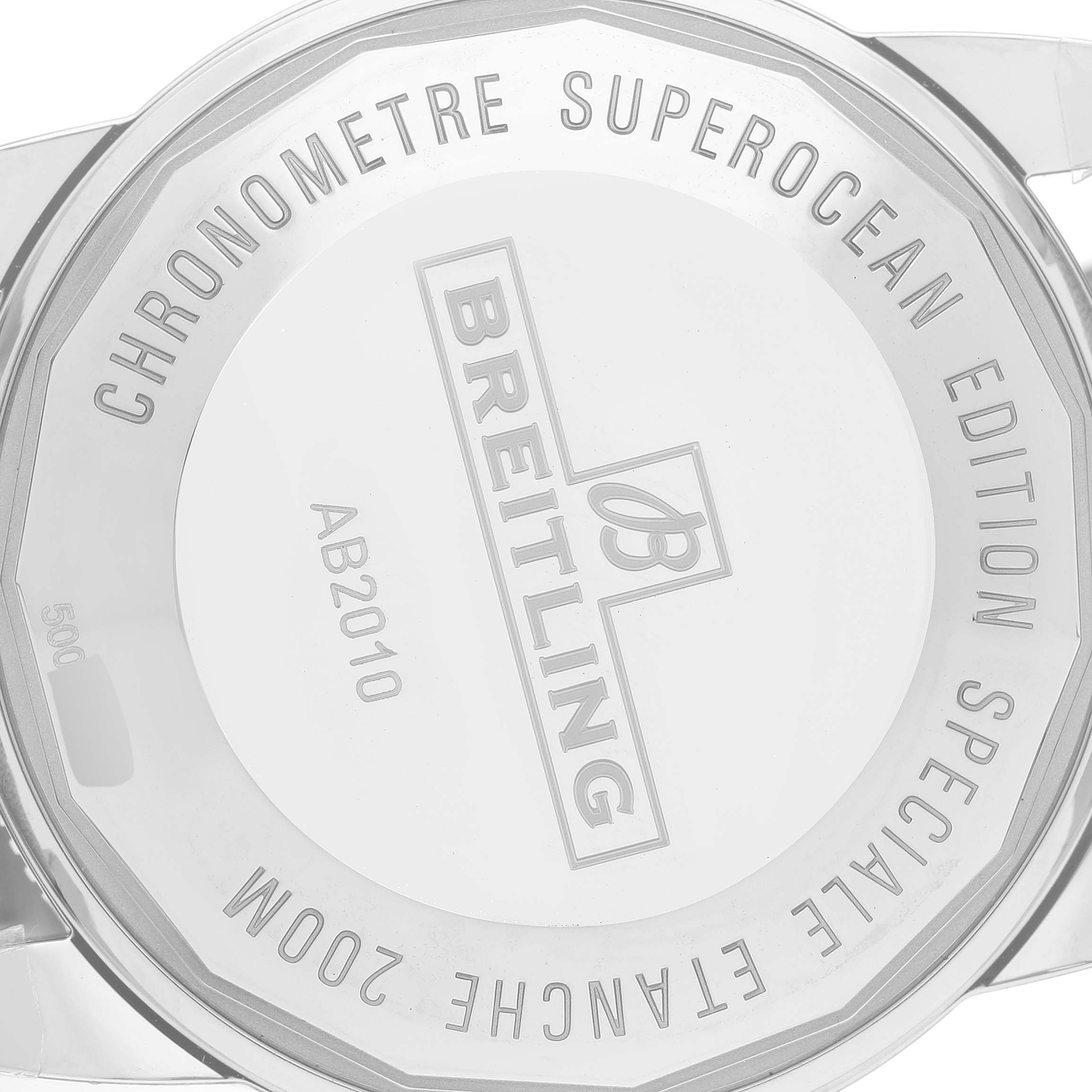 This image shows the backside of the Breitling Superocean AB201033/G827 Men's Stainless Steel Silver Dial AB201033/G827 Men's Stainless Steel Silver Dial watch with inscriptions detailing its model and specifications.